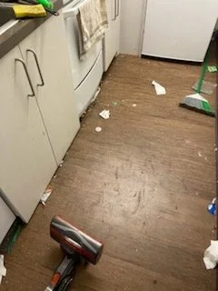 Kitchen Floor Before Cleaning
The kitchen floor before our team removed debris and completed detailed cleaning throughout the space.