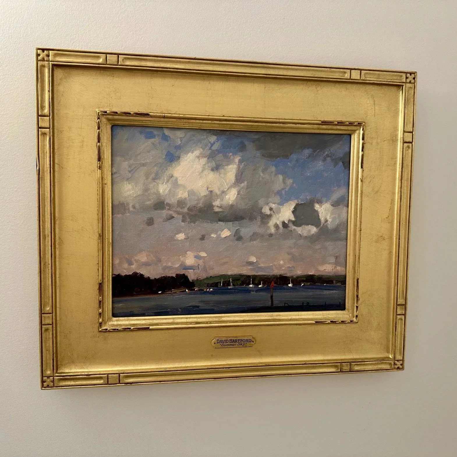 artwork in gold frame