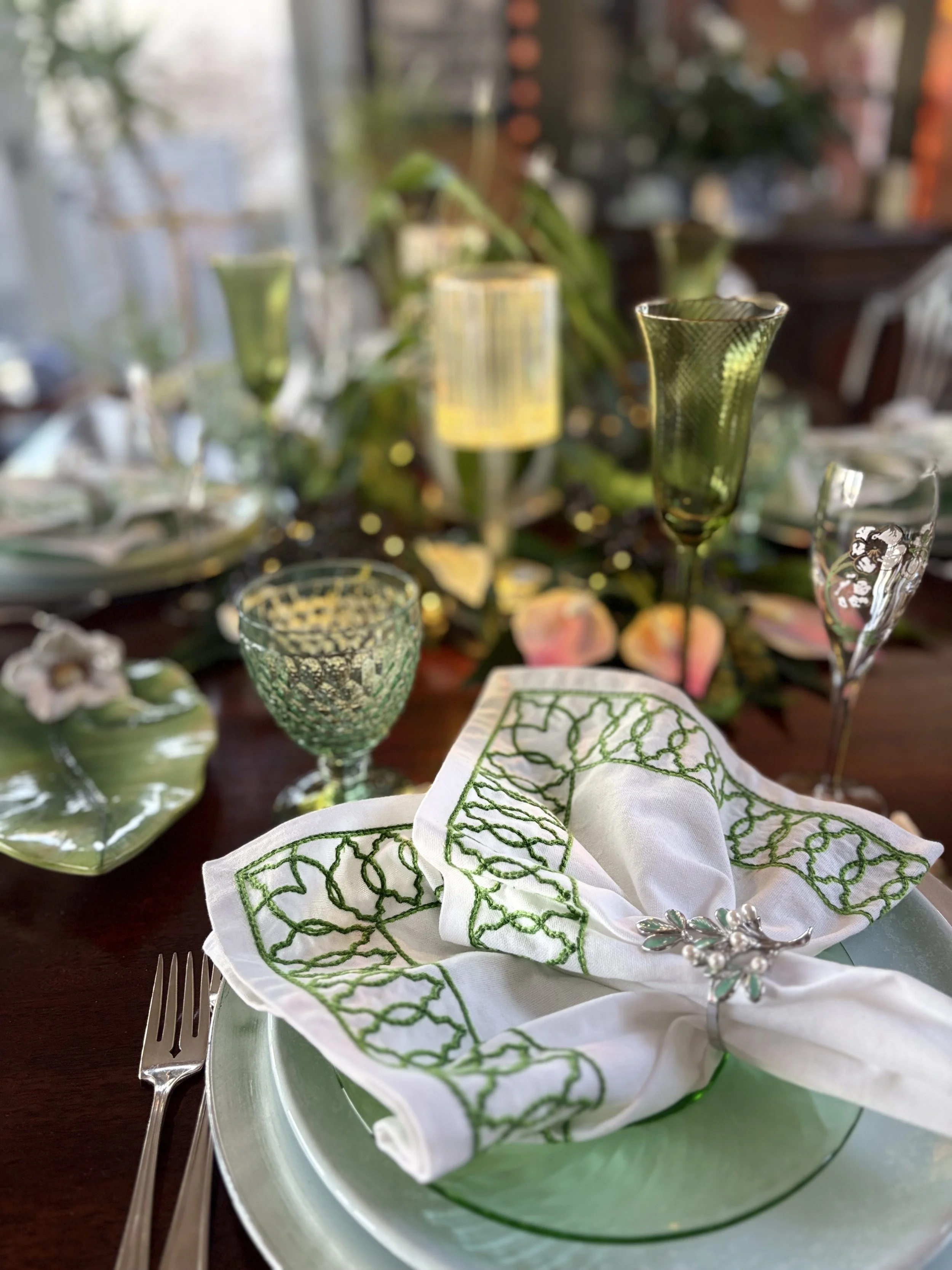  Elegant Spring tablescape with green and white theme, peace lilies, and blue tranquility plates for Easter brunch 