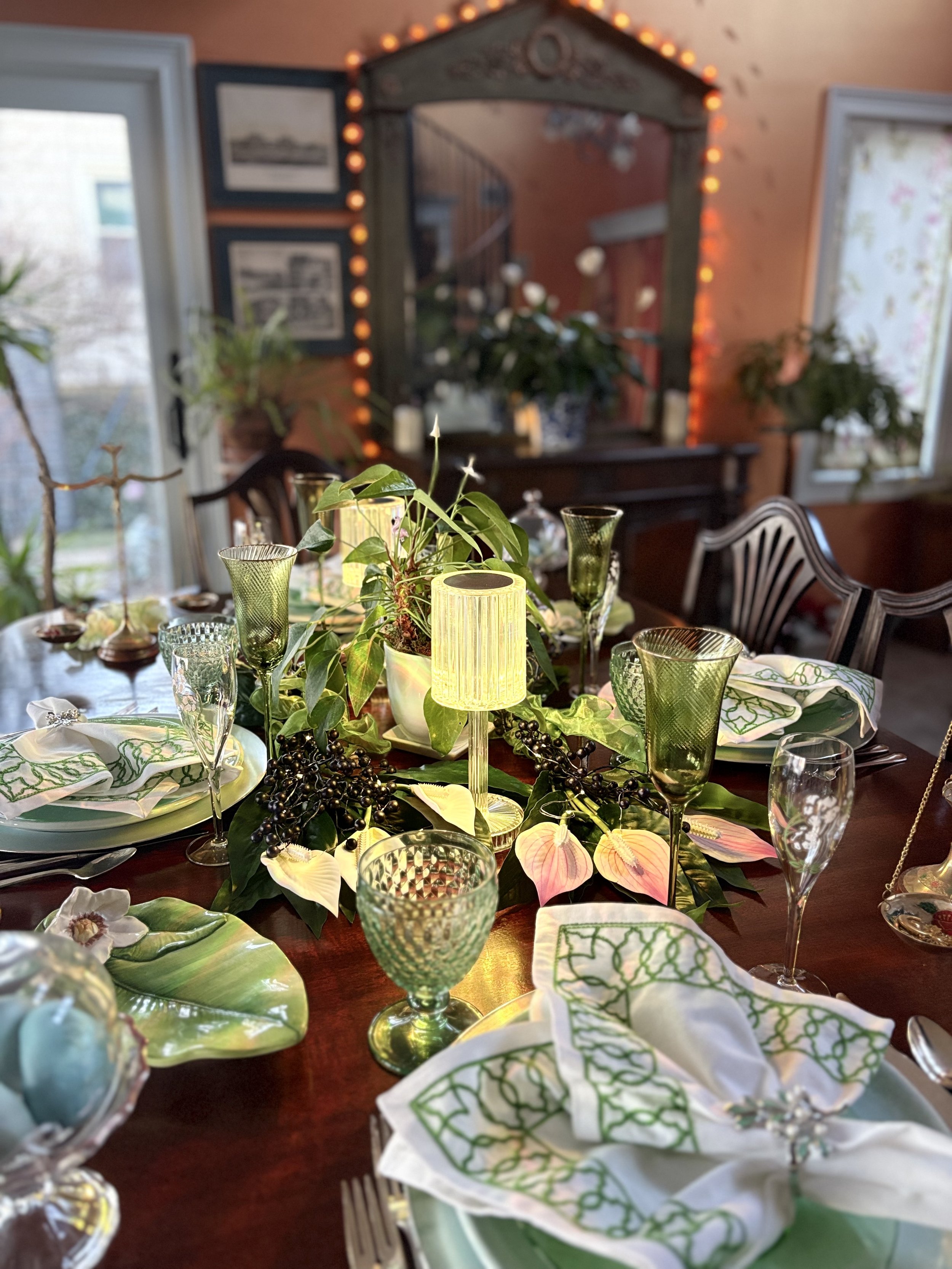  Battery operated green table lamps and twinkling fairy lights for a moody and magical spring dinner party 