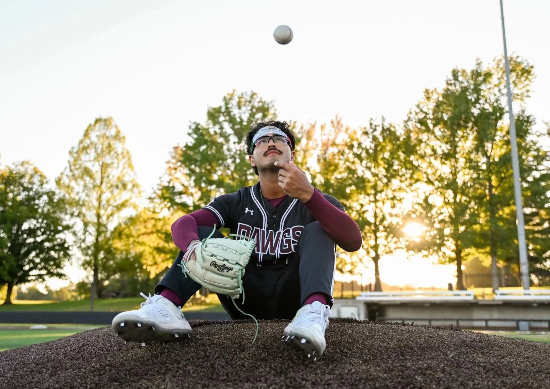 Al Holguin, pitcher for SIU baseball, 22, sits on the pitchers mound for a portrait Wednesday Oct 2, 2024 at Itchy Jones Stadium in Carbondale, Illinois. 