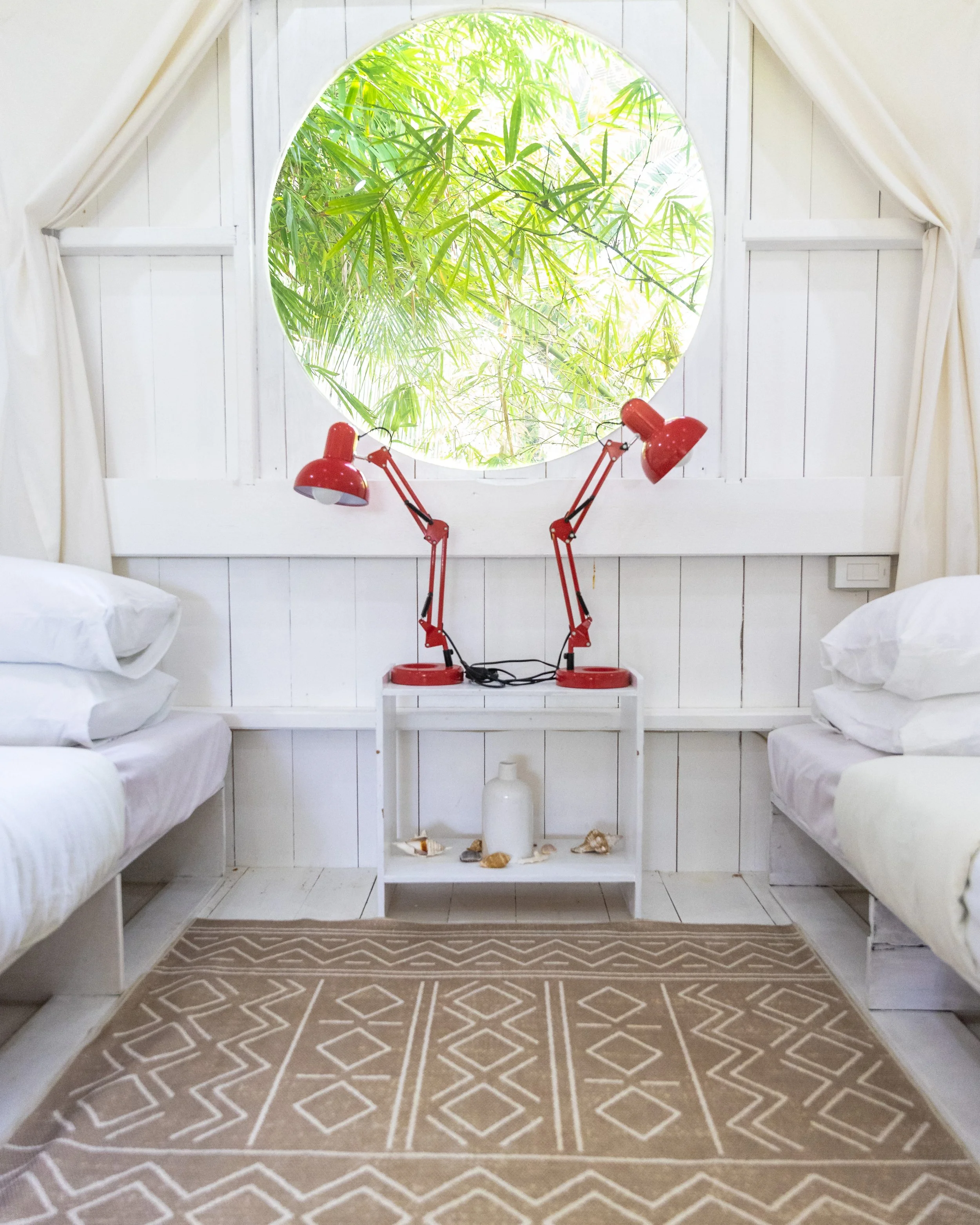 close-up view of the beds in the second floor of the shared villa at Daloy Yoga retreat in Siargao, Philippines