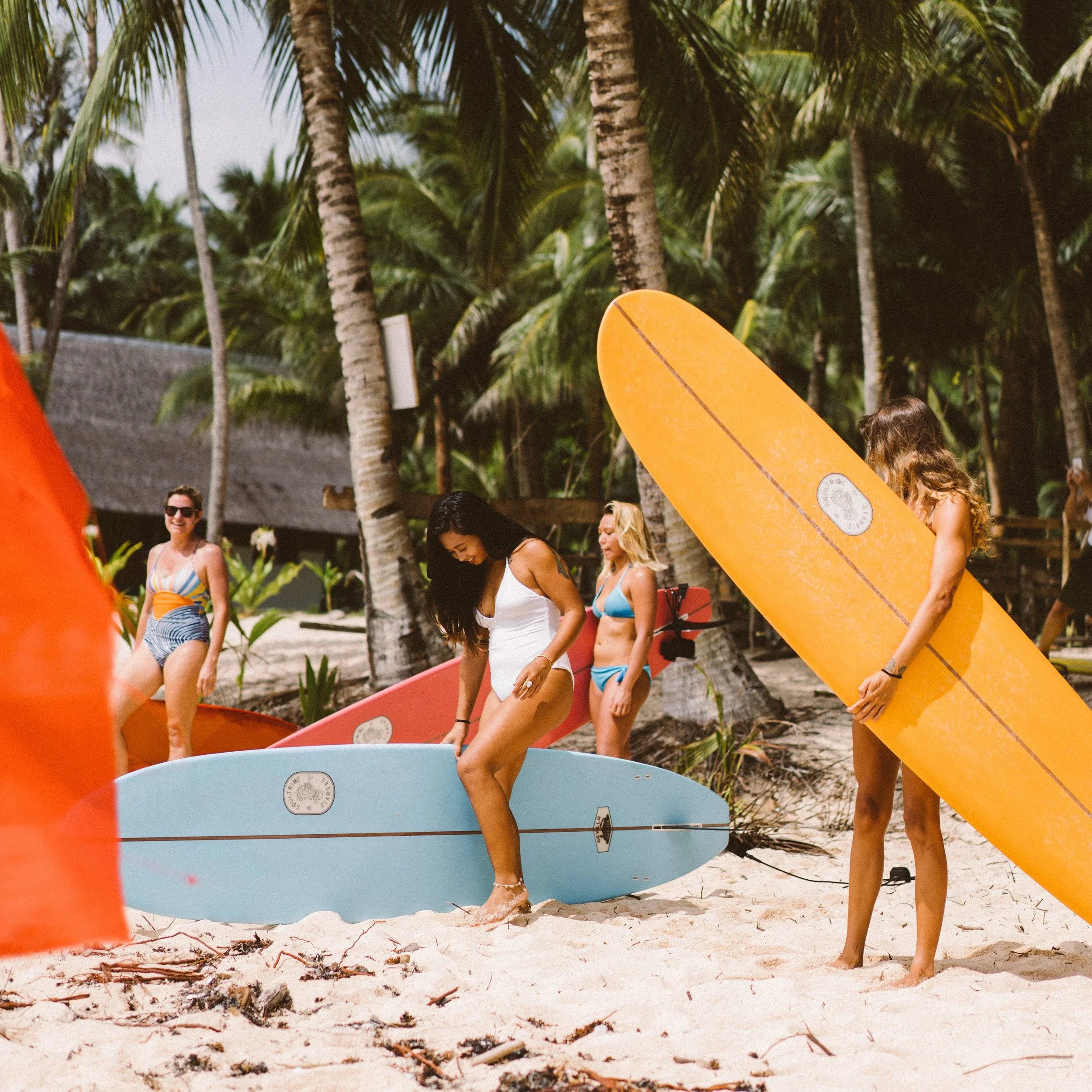 Surfing session at Daloy Yoga retreat in the Siargao, Philippines