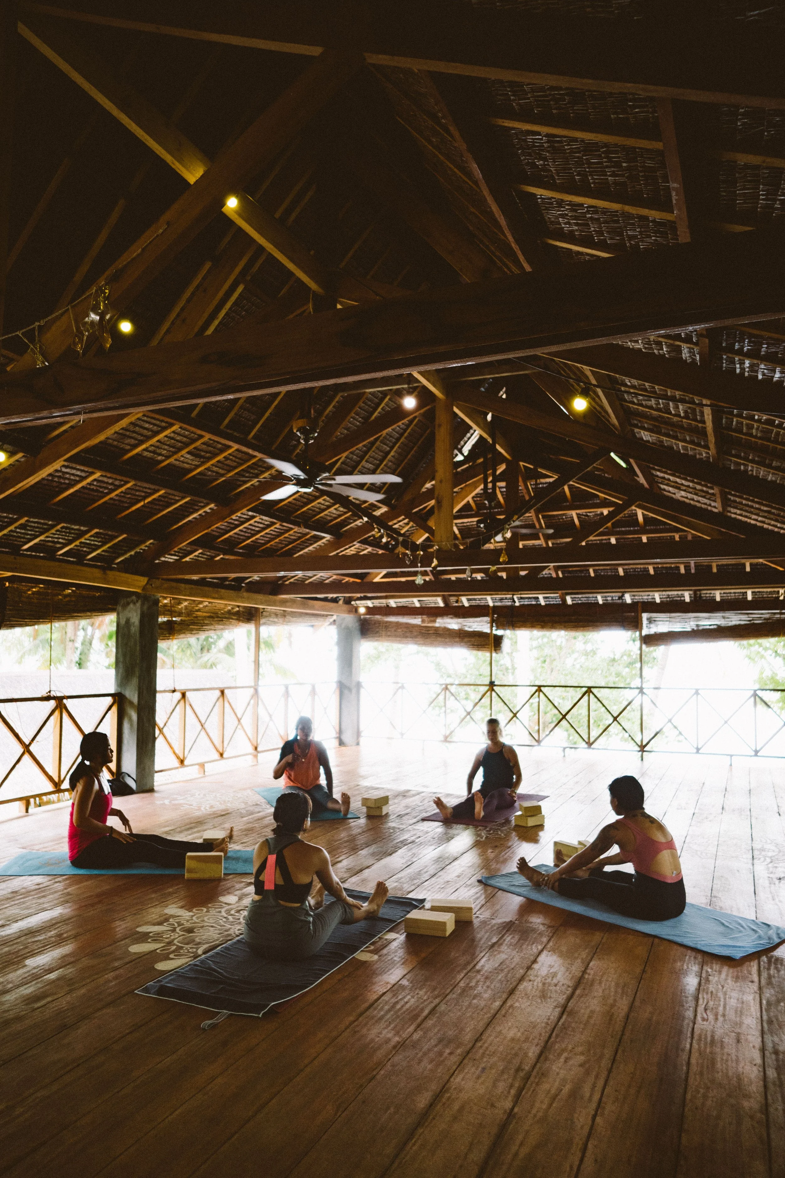 Group photo of Daloy yoga retreat guests during integration day where yoga workshops and philosophy are explored