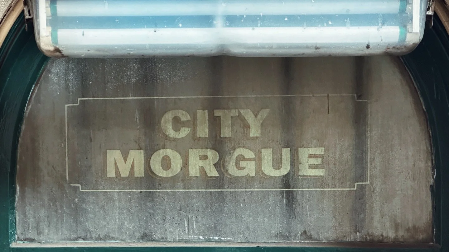 It was an appropriately dismal Melbourne autumn day when I found it.

Rain on Russell Street. Cold light on old stone. And there, in a window of the former City Court, painted in the bluntest possible terms, were two words:

CITY MORGUE

A true ghost