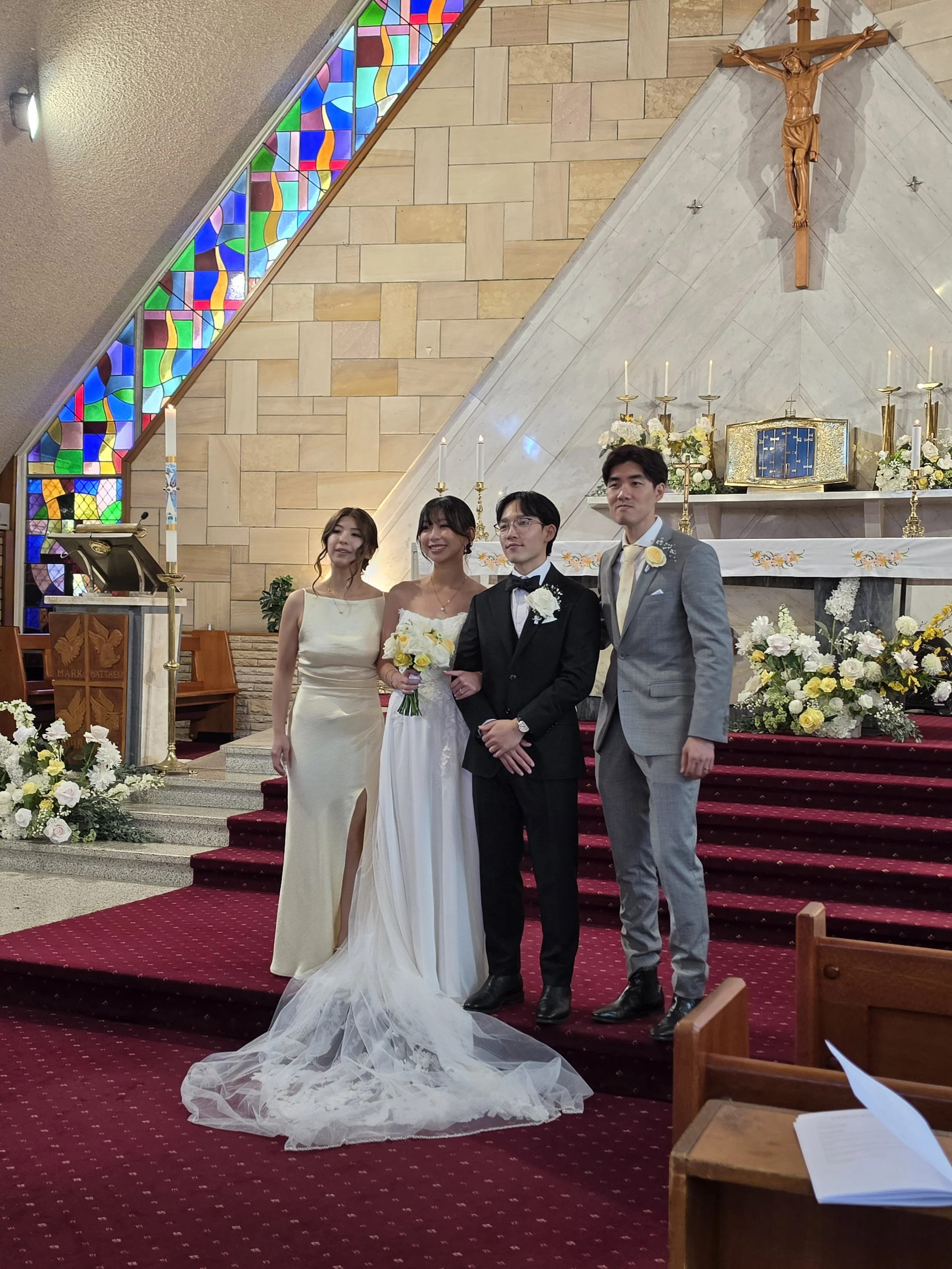 Bridal party at a wedding church ceremony  by Love story Blooms