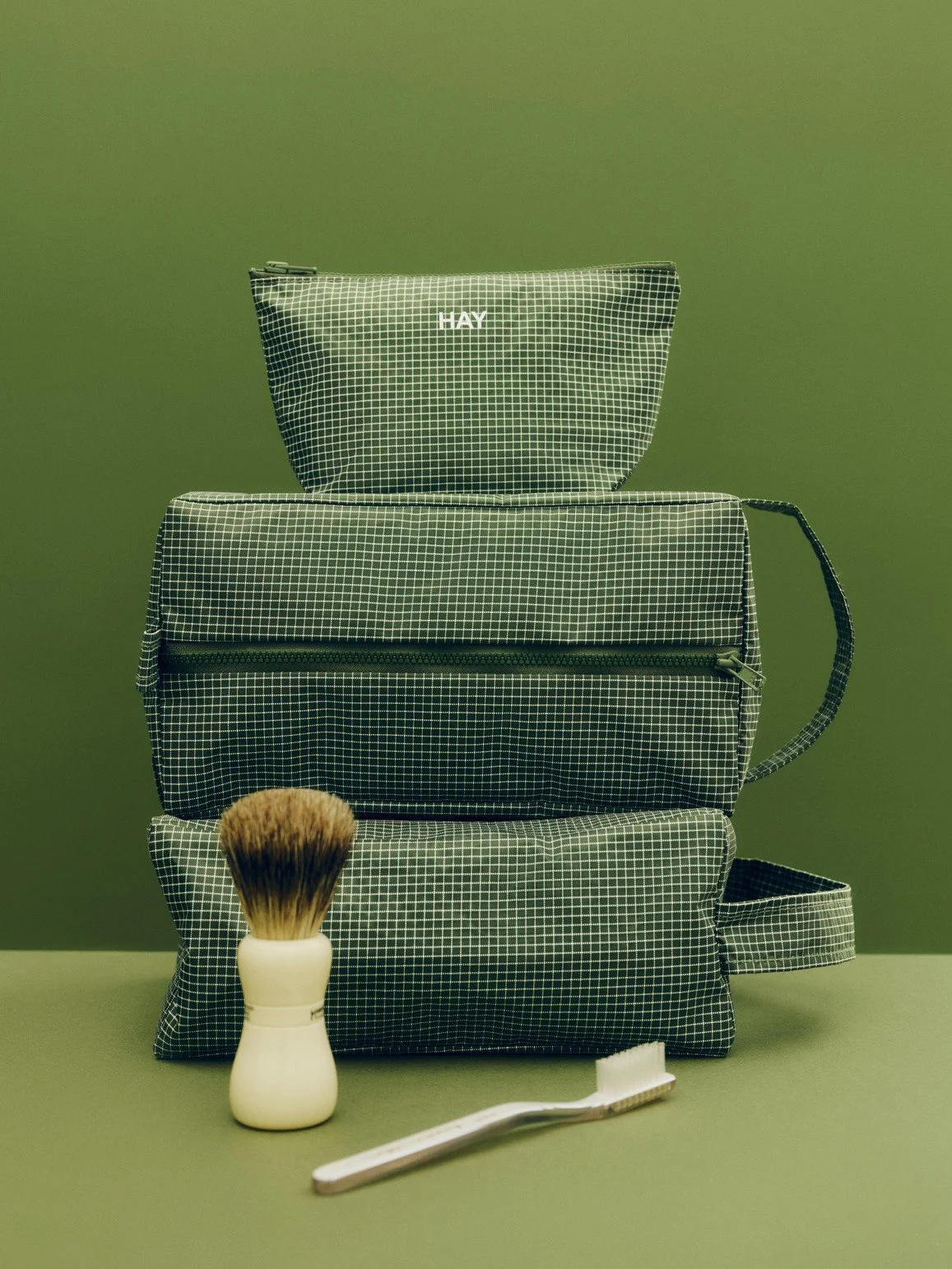 wash-bag-trousse-toilette-recycle-hay-momentum-design-store-lille-rijsel-curation-lifestyle-mobilier-Grid Wash Bag S dark green_Grid Wash Bag M dark green_Grid Pouch S dark green.jpg