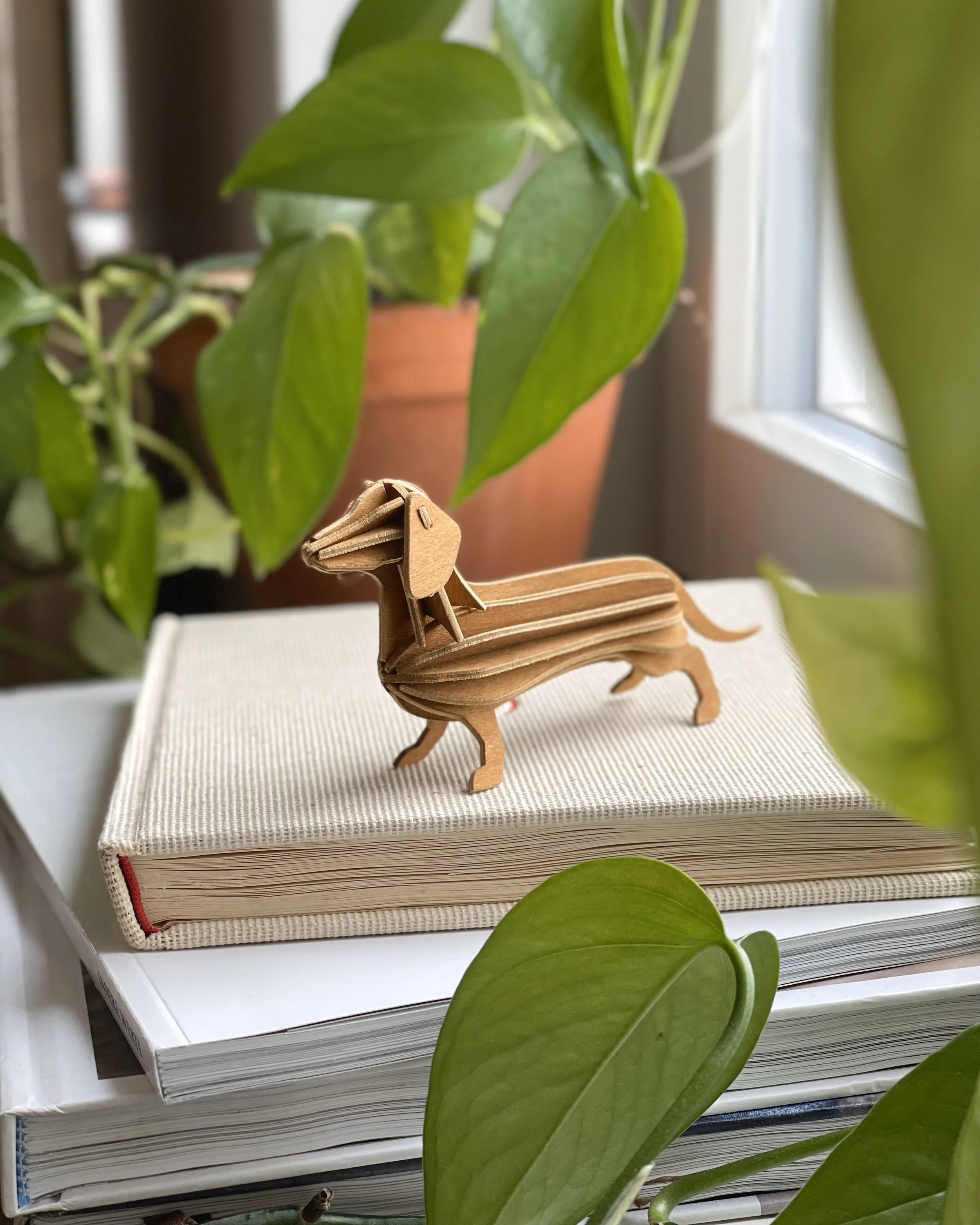 Lovi Dachshund 12cm cinnamon brown on windowsill.jpg