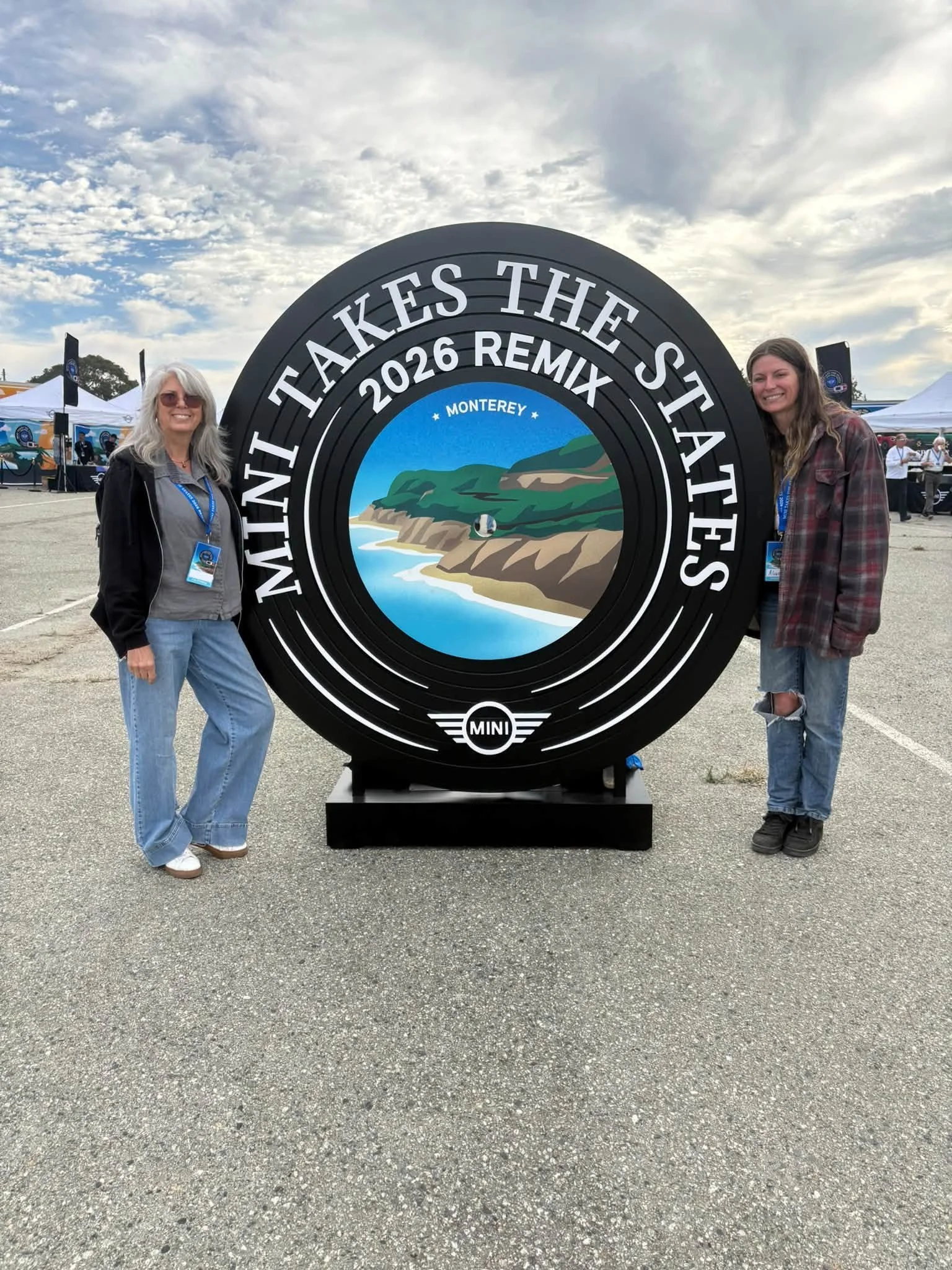 26-10 - mtts-ca - mother-and-daughter-at-monterey-sign.jpg