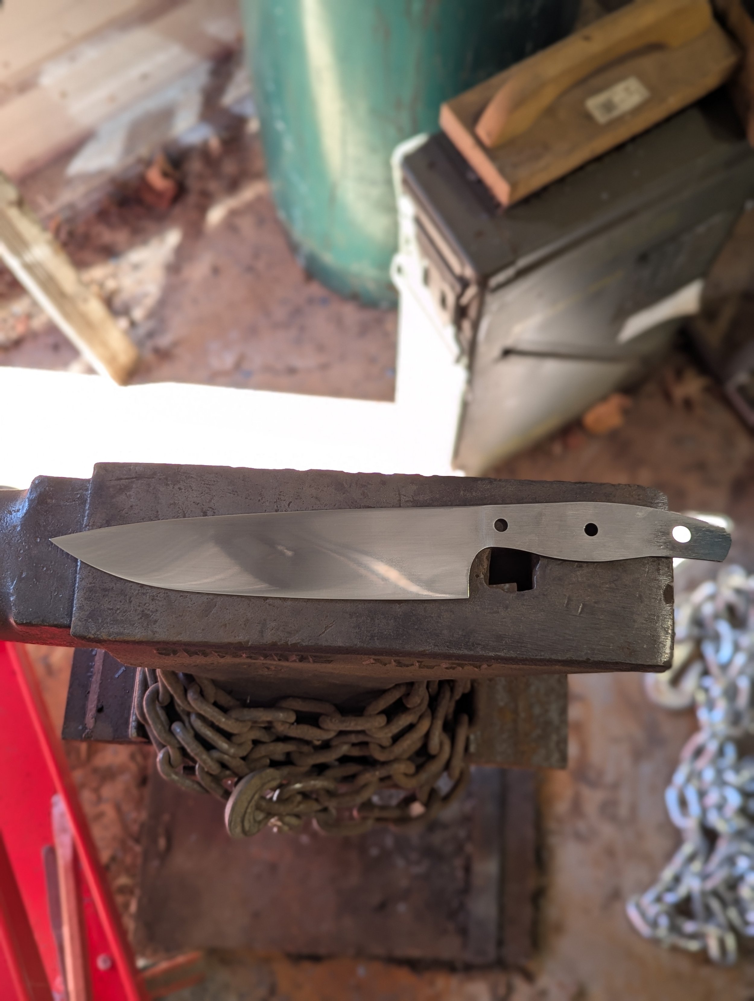 Hand sanded to 800 grit which leaves a nice satin finish.