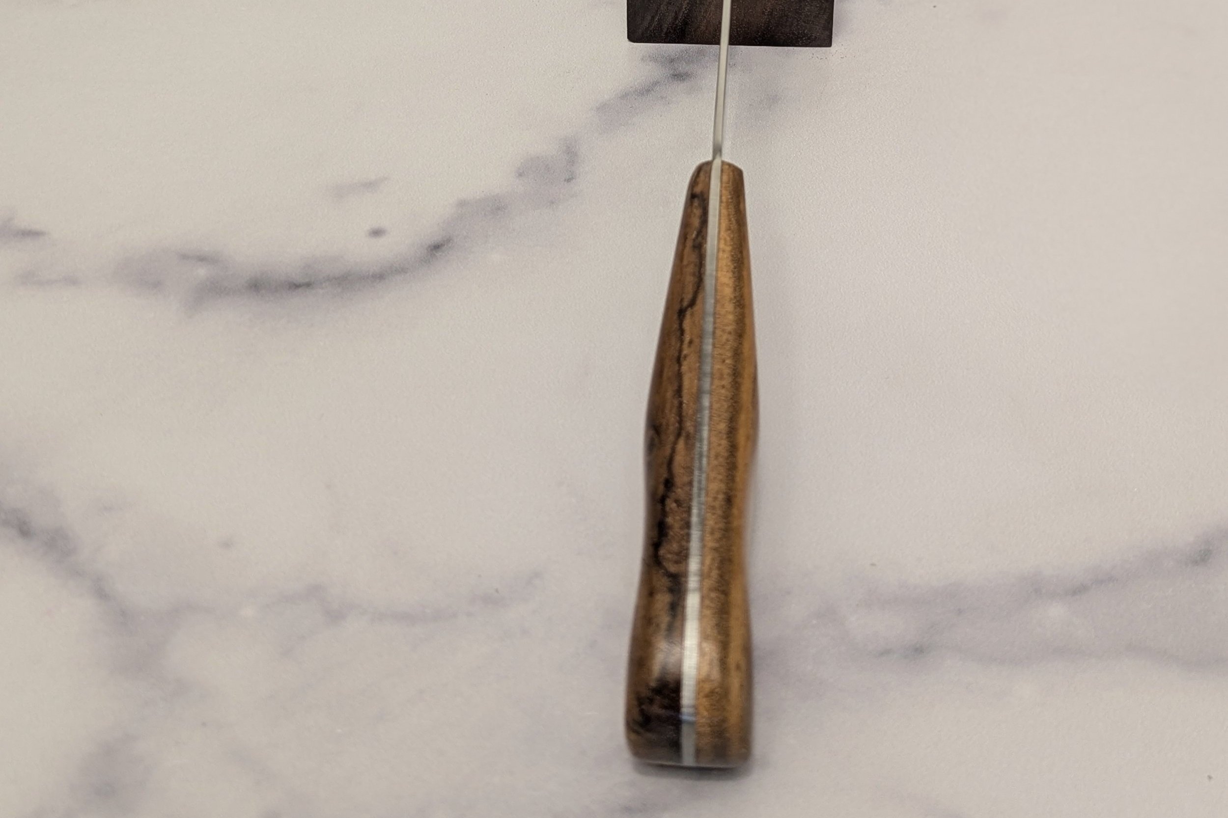 Coke bottle shaped handle