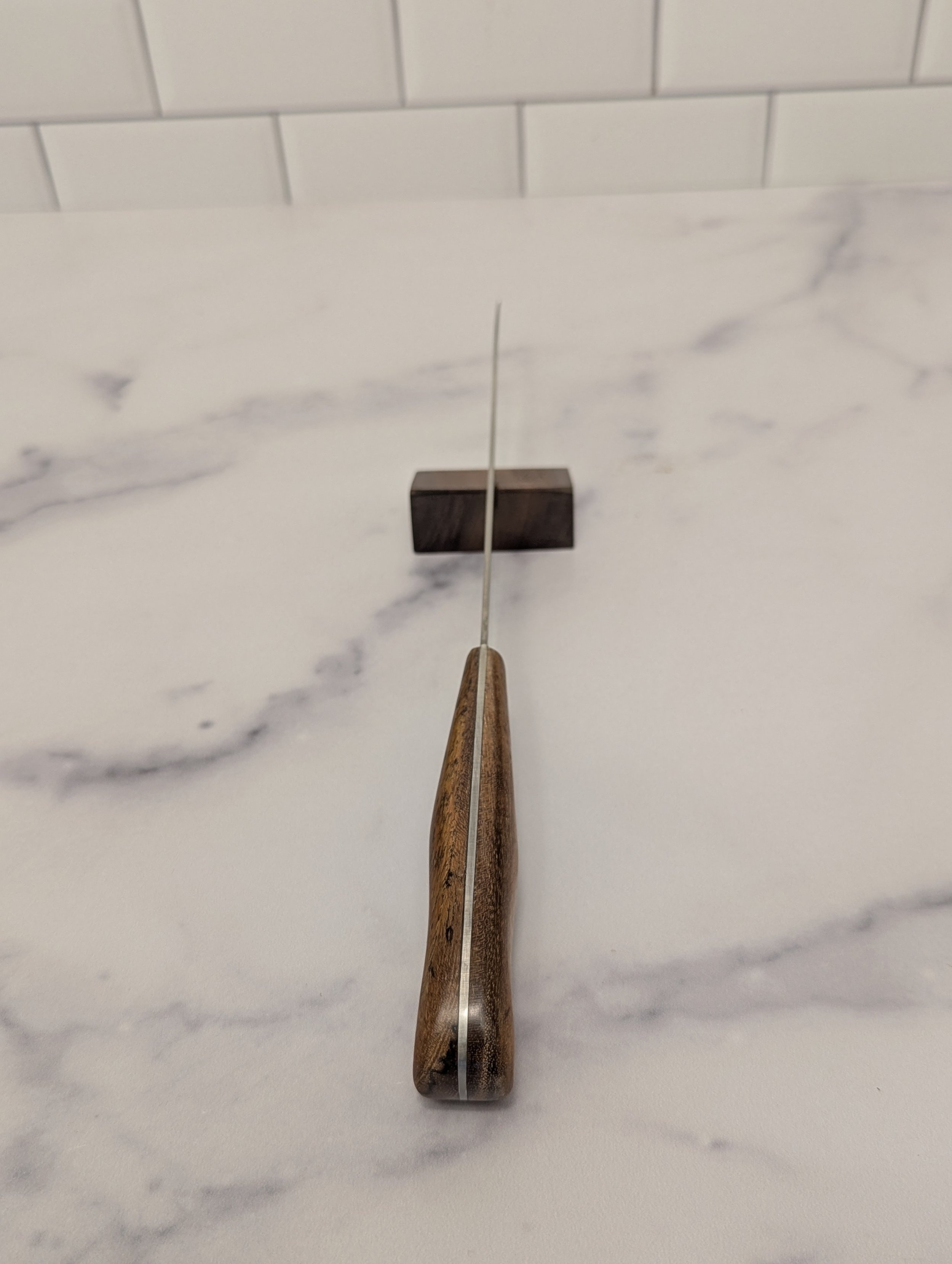 Looking down on the "coke bottle" shape of the handle.