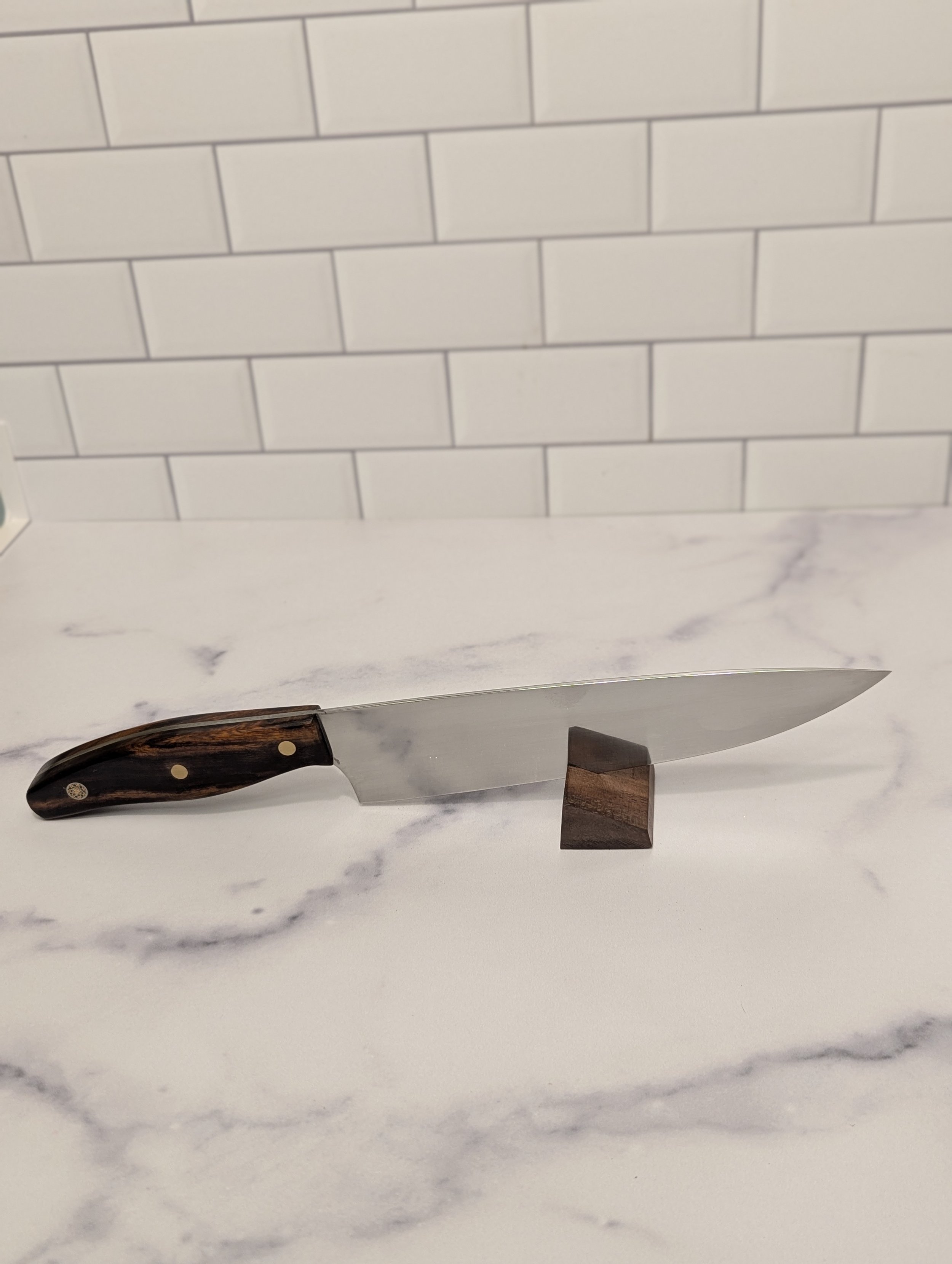 Knife weighs 7.7oz