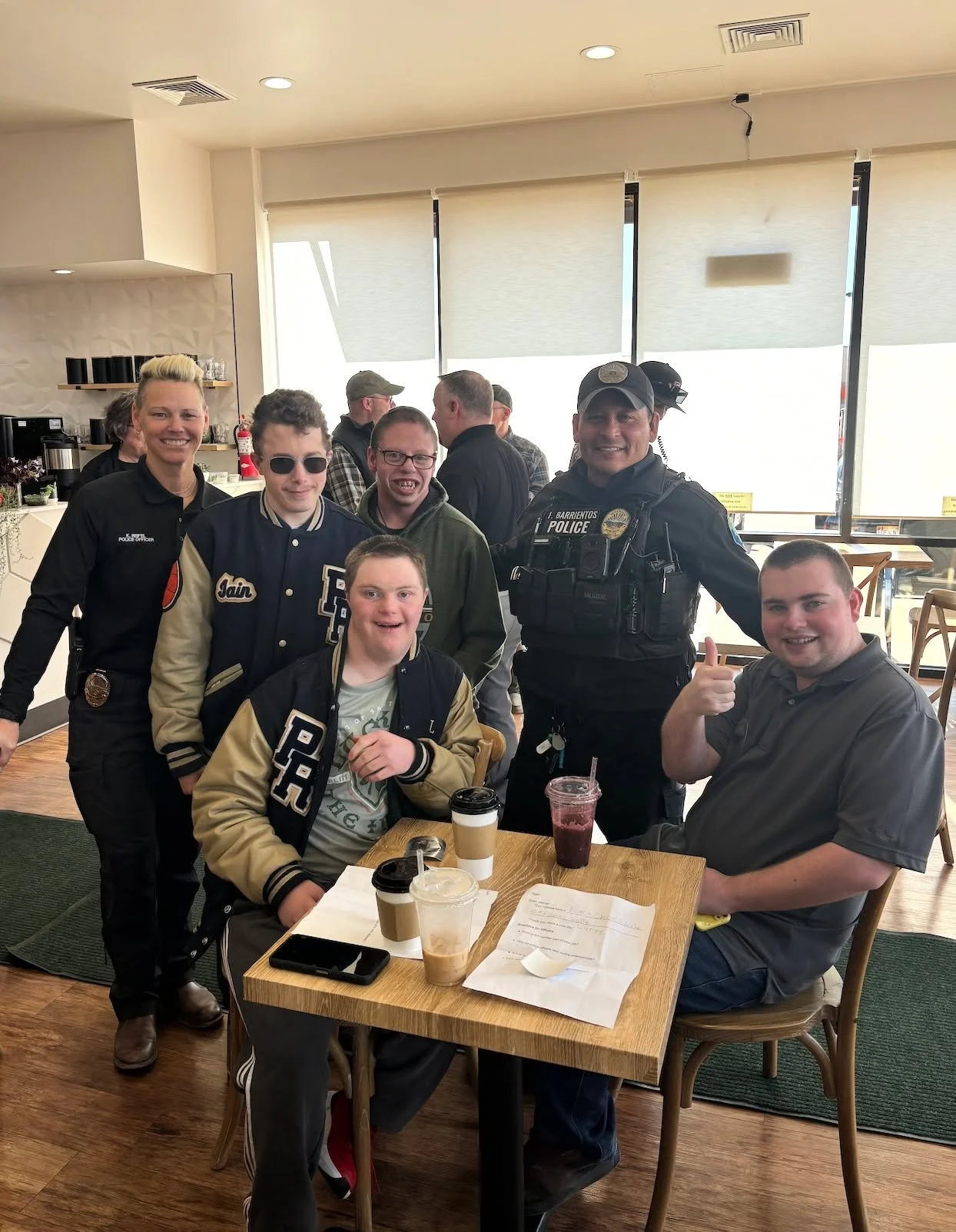 Thank you D38 Transitions class (18-21 yr olds)  for coming to see us!

This group came in to practice their purchasing skills today and they got to spend a little time with the Monument PD for Coffee with a Cop.