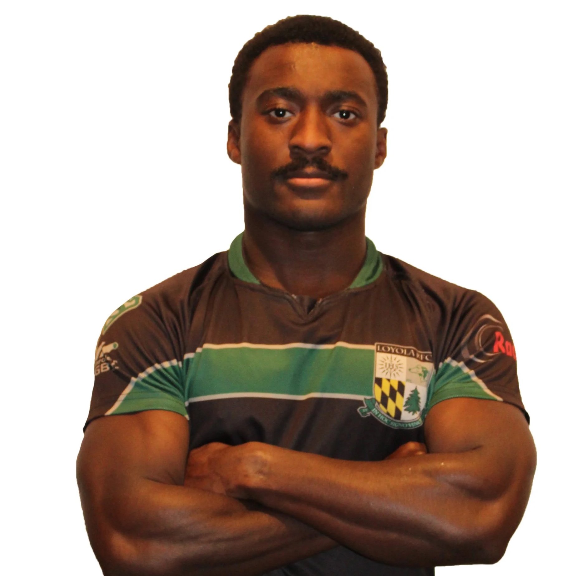 Person in a sports jersey with folded arms