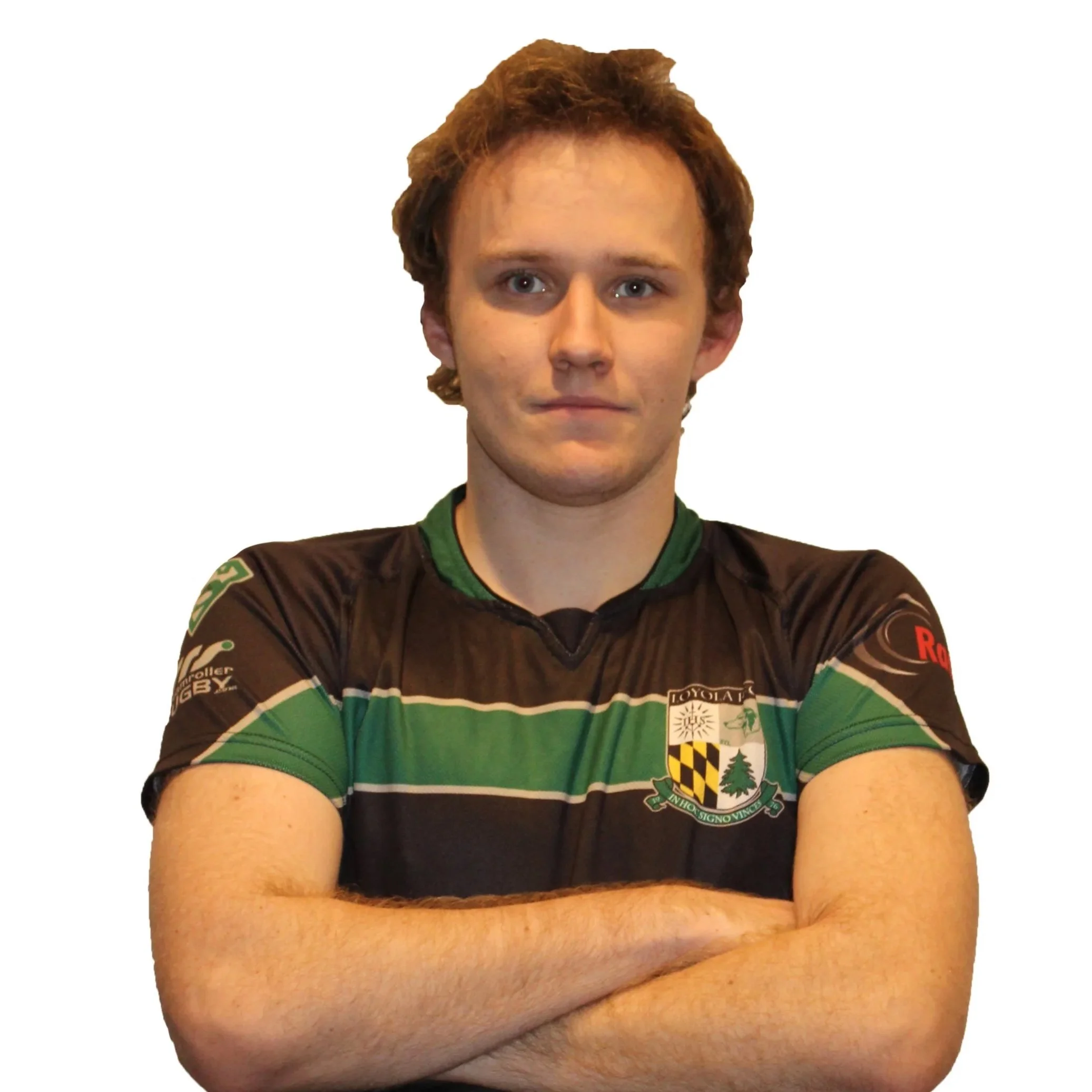 Rugby player in team jersey posing against a plain background.