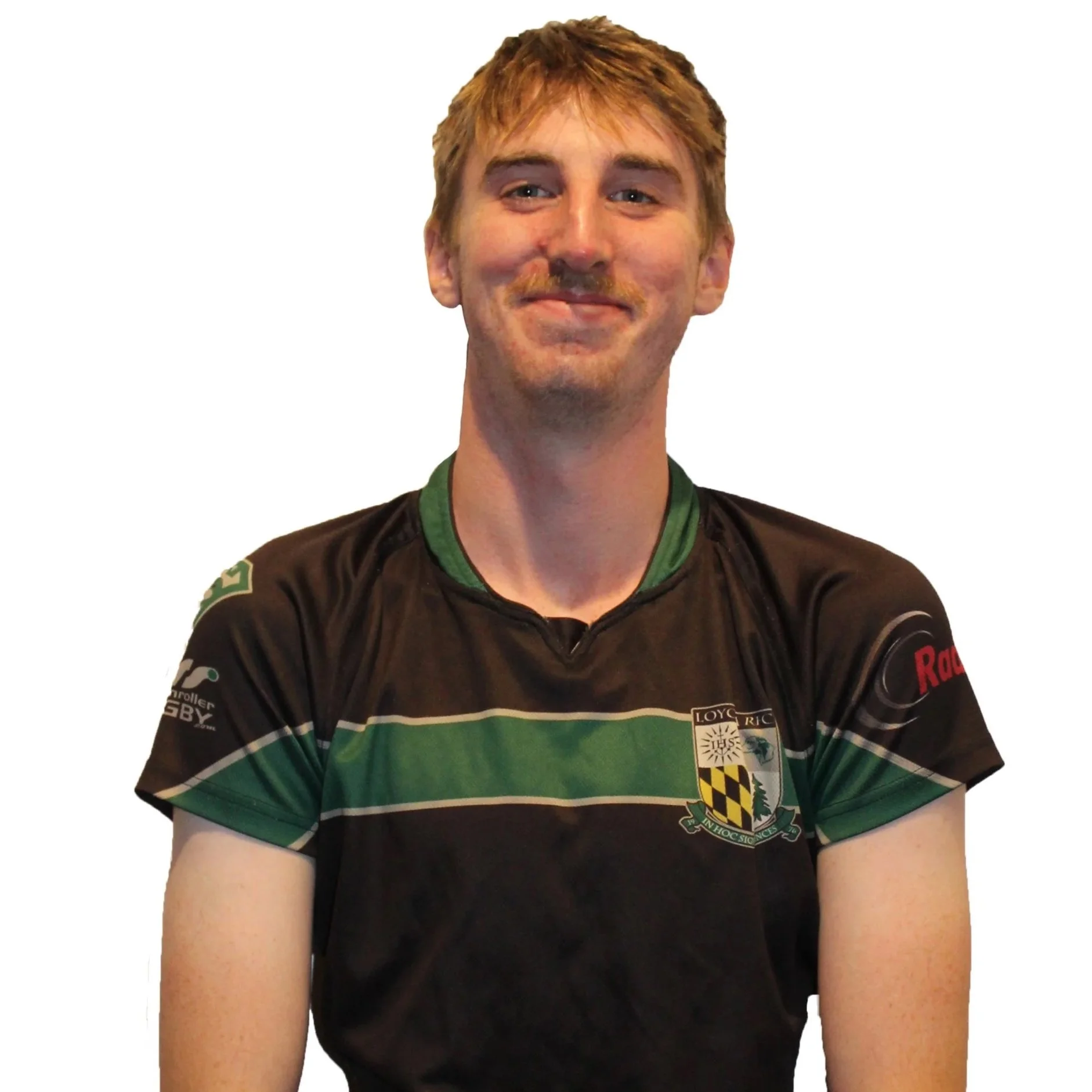 Person in a rugby shirt with arms crossed, neutral expression, short blond hair.