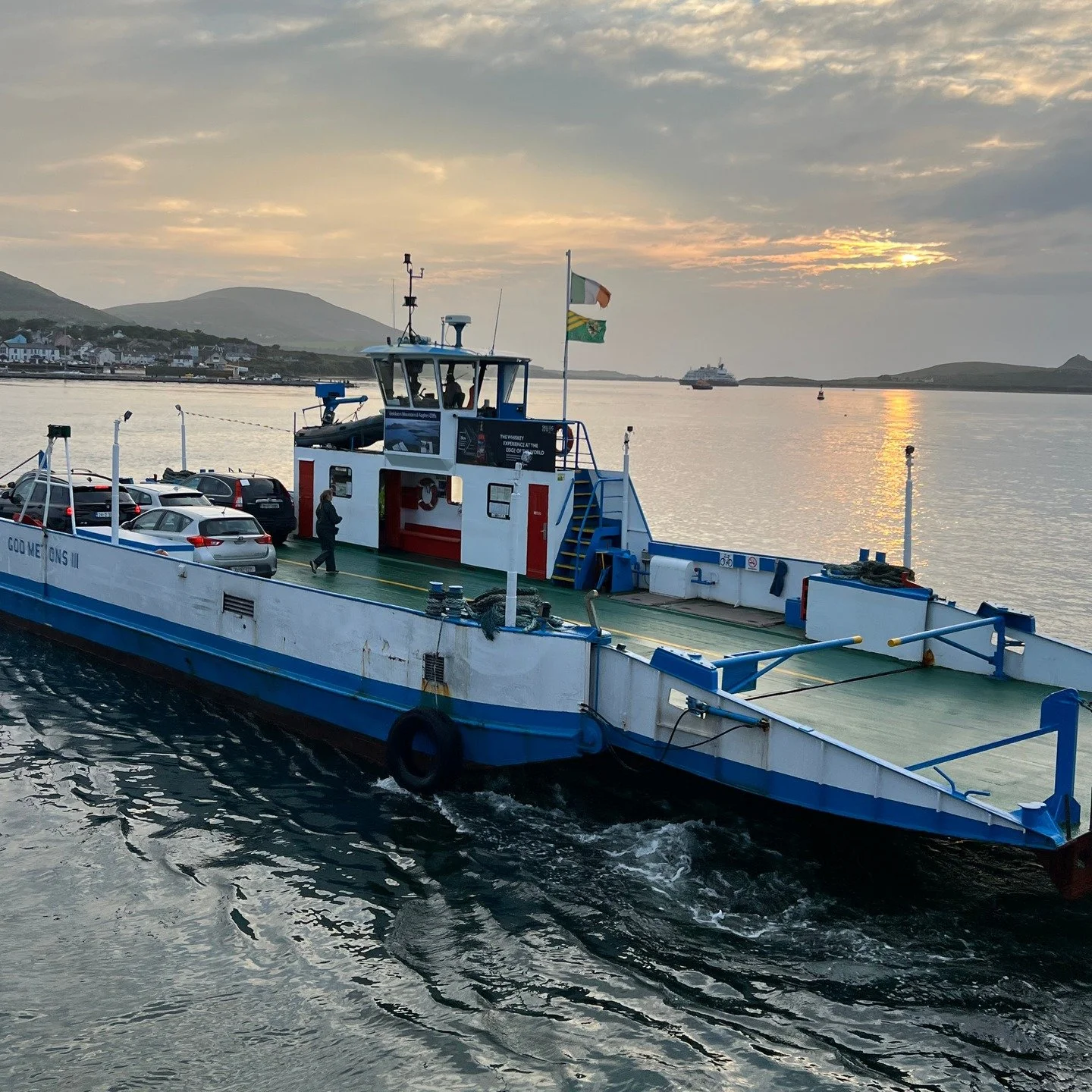 Dusk in westernmost Eurasia: Iveragh peninsula, County Kerry as the ferry crosses to Valencia island and a boat heads out for Skellig Michael island

#eurasia #ireland #iveraghpeninsula #countykerry #rosendbarnabyinireland #valenciaisland #skeligmich