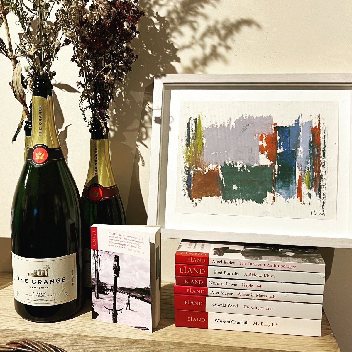 Eland&rsquo;s new pop-up bookshop at The Cellar Door, The Grange Winery, Alresford @thegrangewine &ndash; award-winning English sparkling wine, alongside original art from The Grange family and award-winning travel writing in the Eland livery @thegra