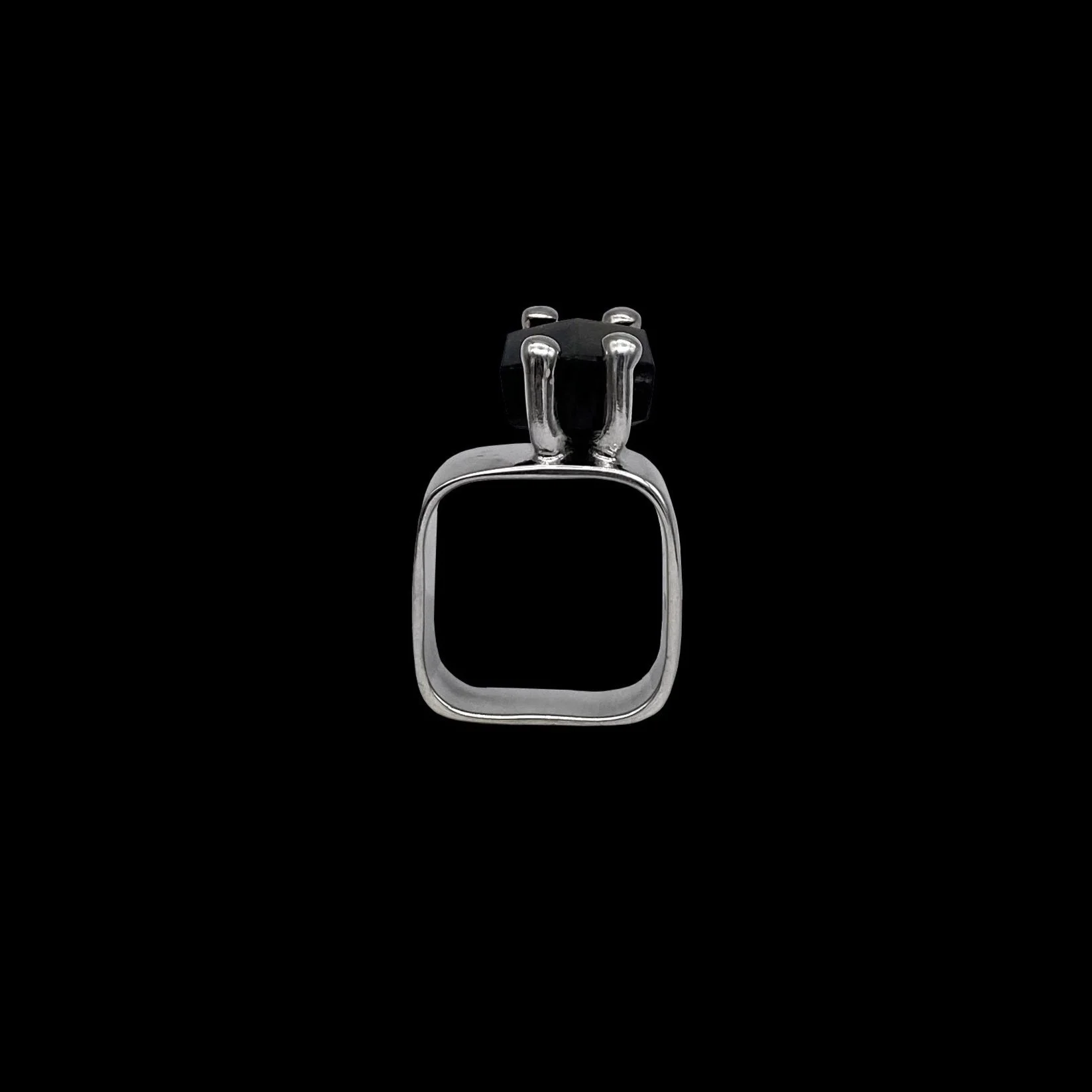 Massive, solid square-shaped high quality silver ring with a faceted obsidian gemstone on top of it, which makes this piece edgy, fierce and mysterious.