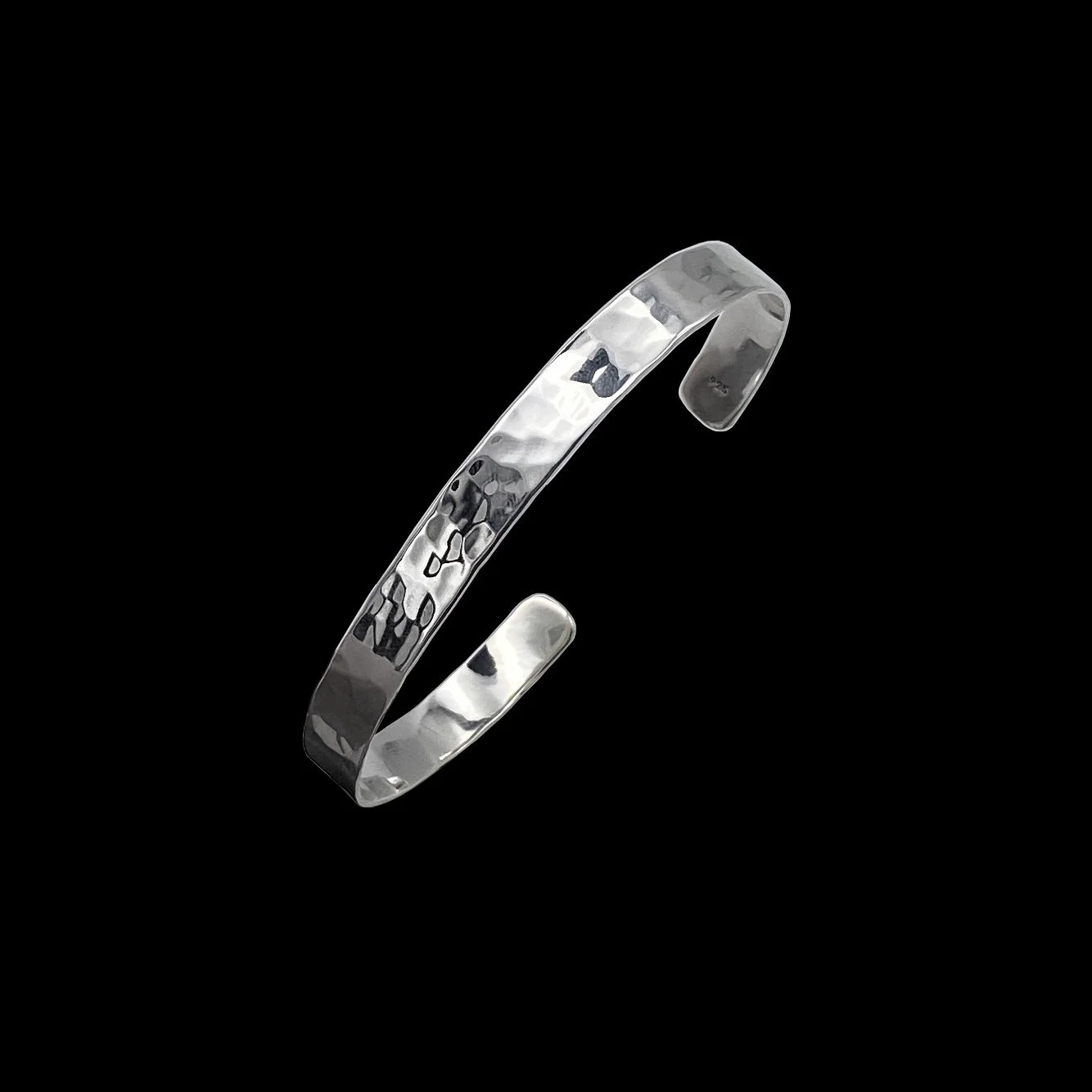 Handcrafted 925 silver cuff, created with elegant form and minimalist design, decorated with beautiful touch of texture, which makes it very unusual and eye-catching.