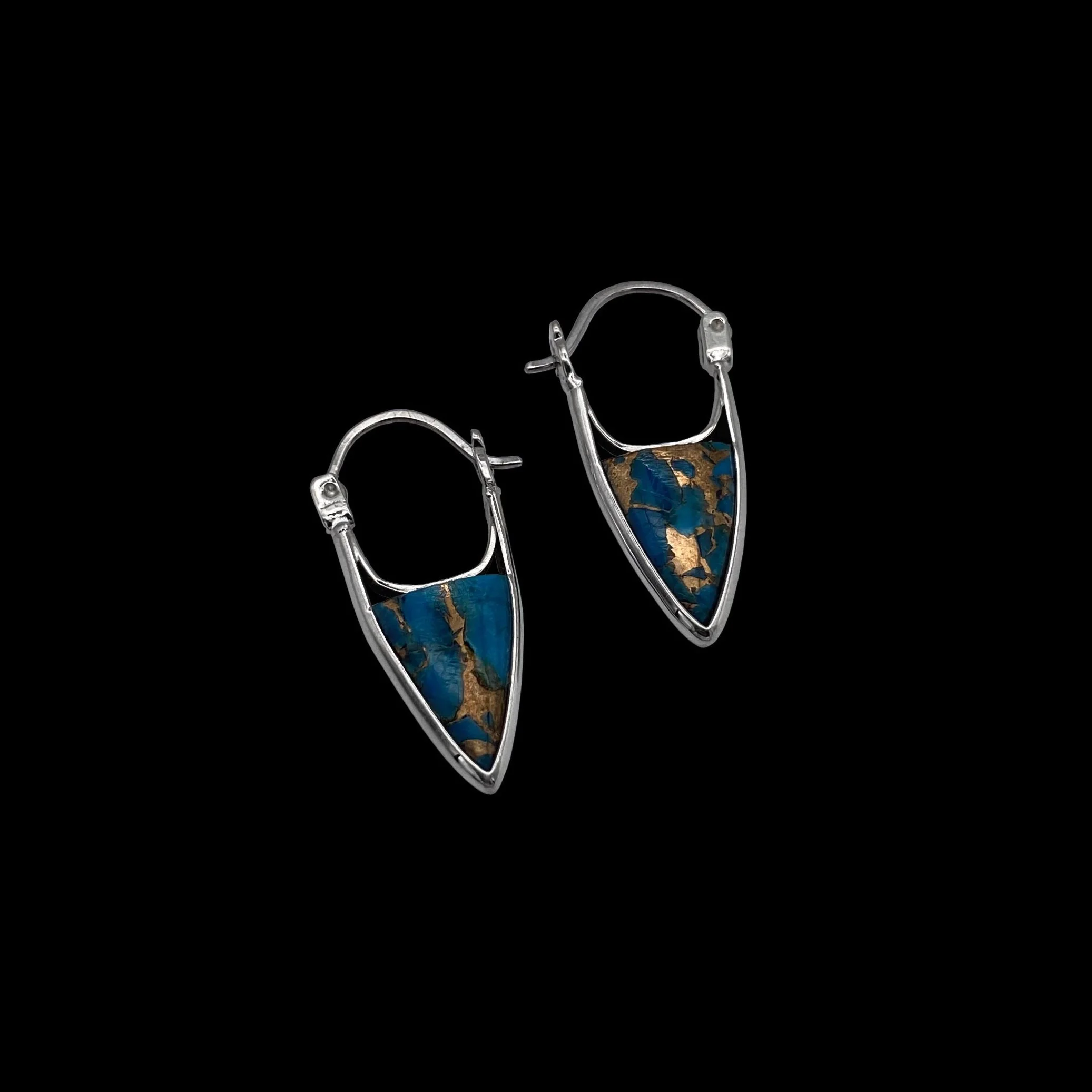 Our bestseller triangle-shaped 925 silver earrings, decorated with the rich touch of compressed turquoise and bronze mix, Small enough for everyday look, but yet unique and hypnotic.