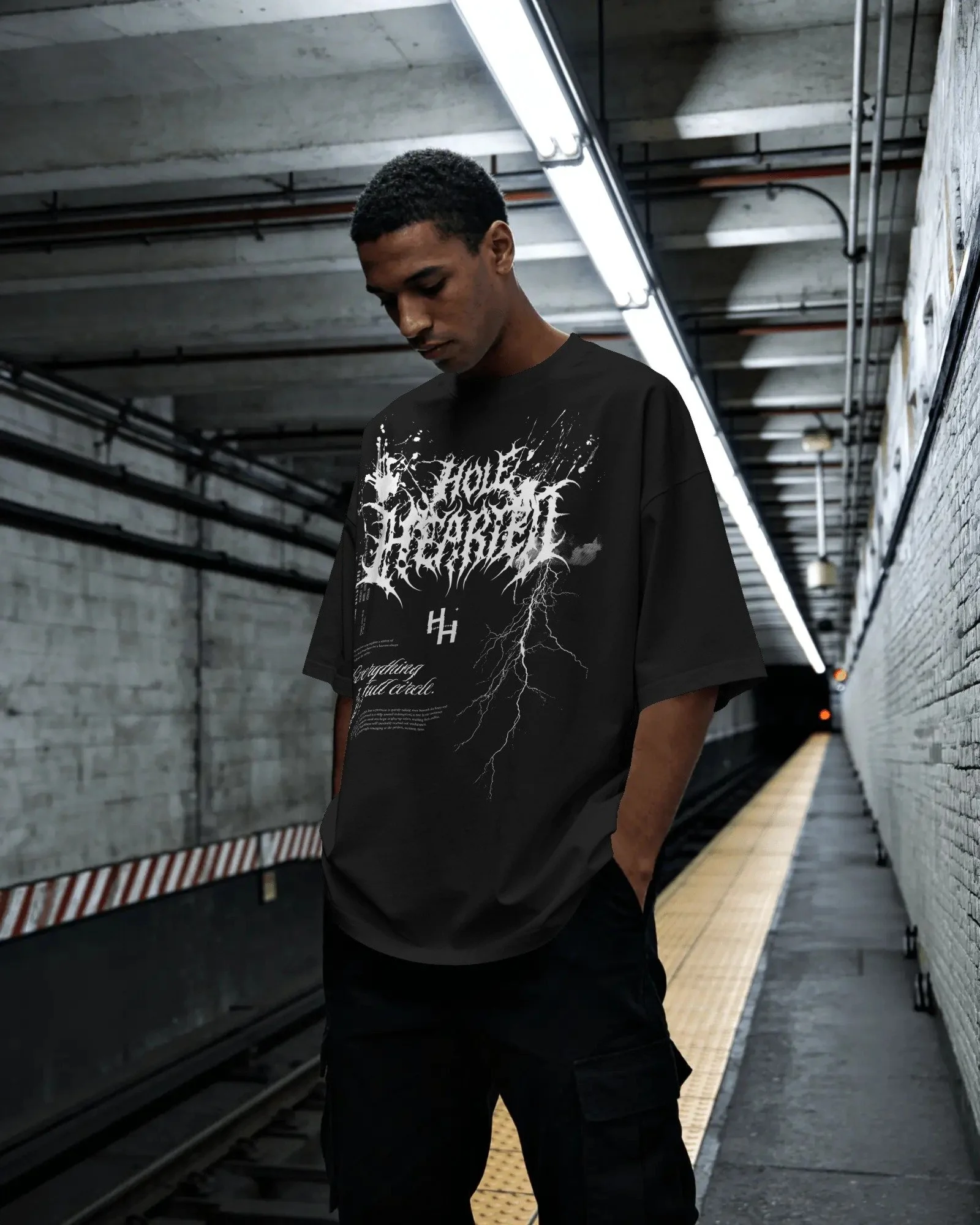 urban-subway-t-shirt-mockup-on-model-with-moody-underground-lighting-and-industrial-background-03951.jpg