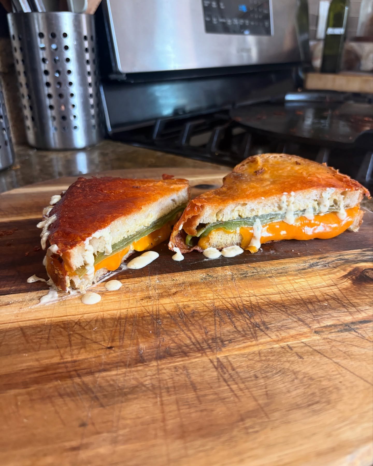 We got a grilled cheese special on our YouTube page today! We collaborated with @smallaxebread using their delicious bread to make a spicy cheese crusted grilled cheese sandwich. Our Jalape&ntilde;o Crema completes this amazing elevated sandwich! #gr