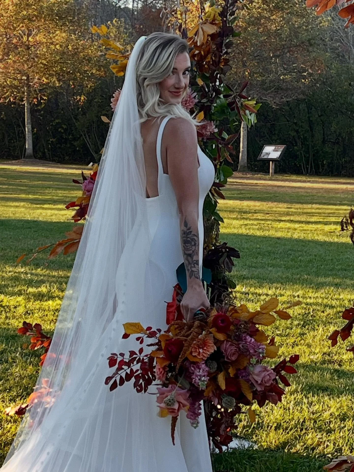 I fell in love with a vintage lamp that had golden leaves and berry colored roses. It just said autumn to me. I designed this color palette, tabletop decor and even the menus using my absolute favorite complementary color combination by adding touche