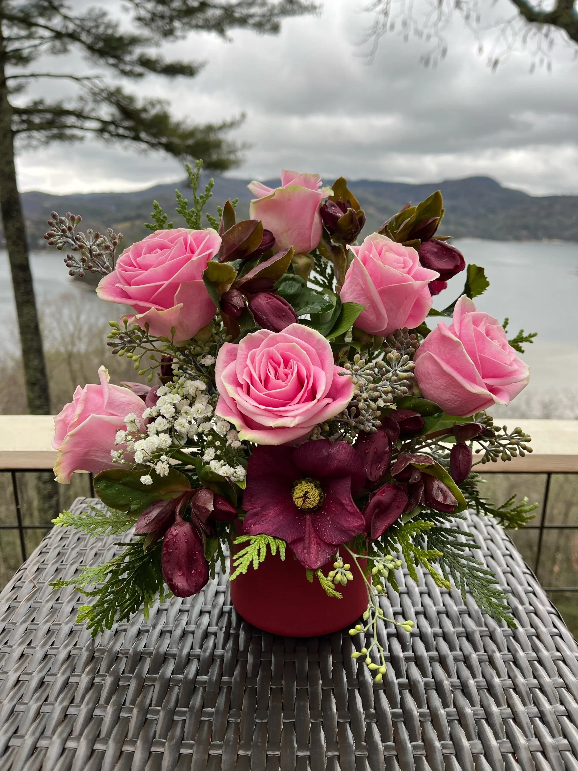 Small Valentine's Day floral arrangement with delicate seasonal blooms in a charming giftable design.