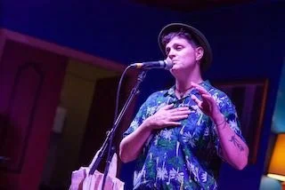 SLAM poet mental health advocate perfroming a poem about gender identity