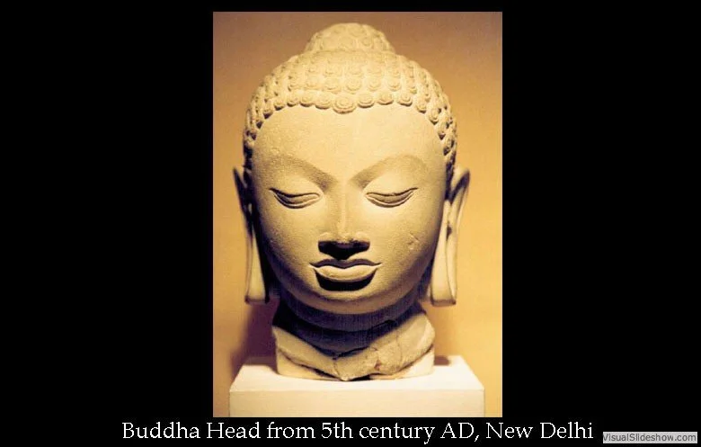 Ancient stone Buddha head sculpture from 5th century AD, New Delhi.