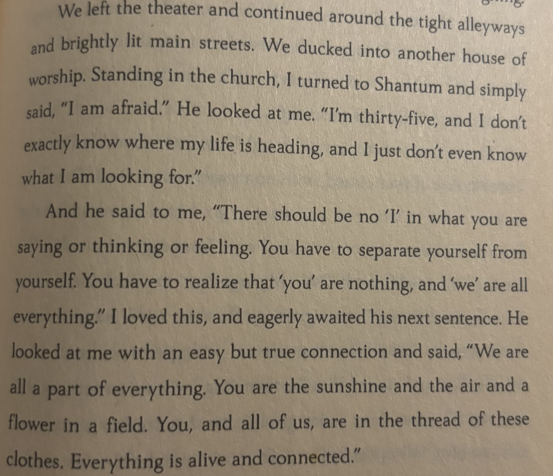 A page from a book containing a passage of text about a conversation in a church, with a focus on the themes of identity, connection, and understanding.