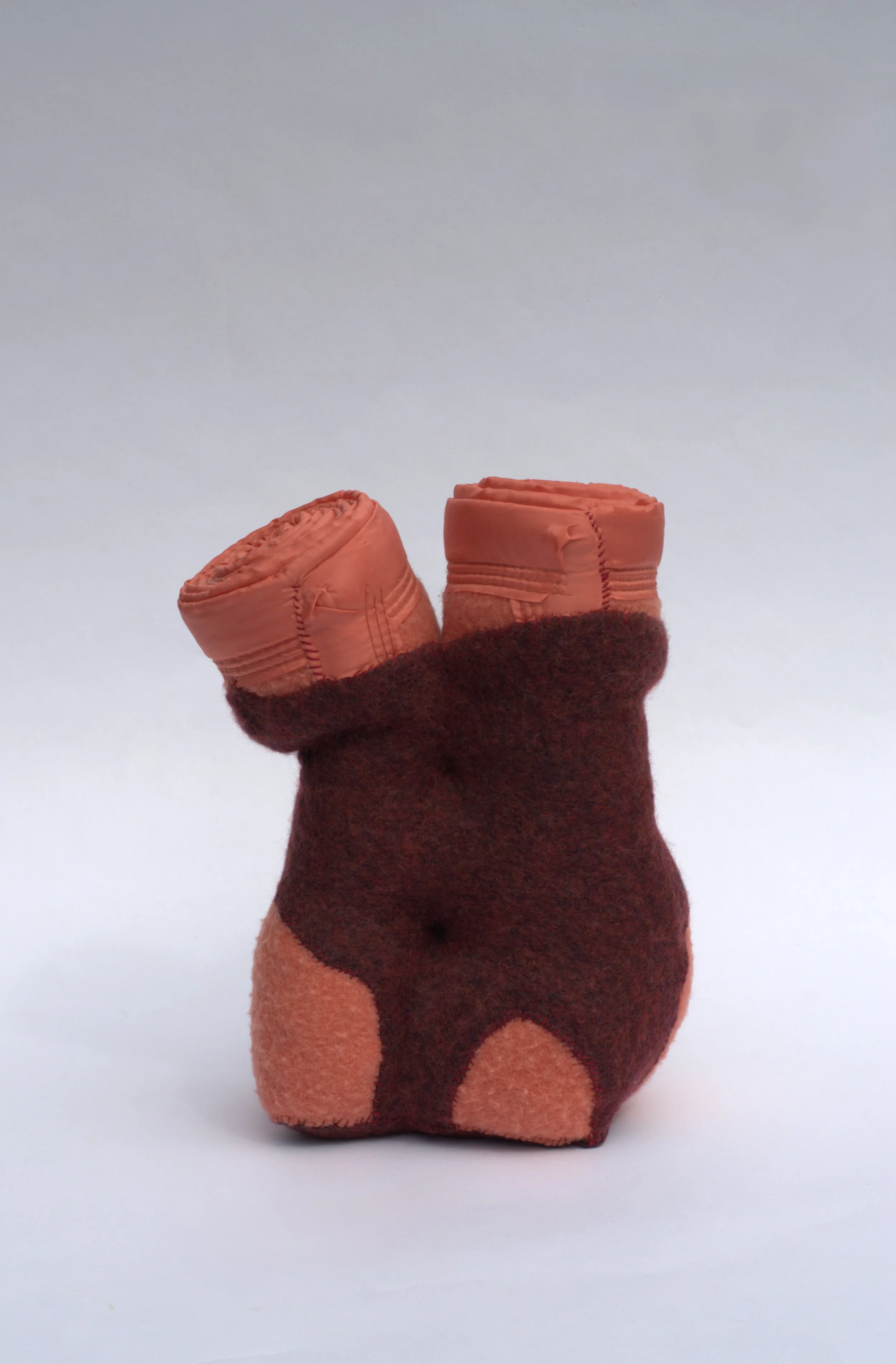  Kristina de Coninck 
 Still
 Sculpture created from sections of a wool
blanket, a vintage cashmere Cacharel sweater
worn by the artist and cotton threads
 40 × 28 × 18 cm
 2023