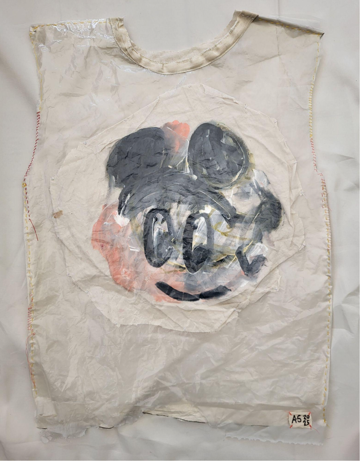  Ant Stevens 
 FAST FASHION FOR PEOPLE LIVING AT THE END OF THE WORLD (3)
 Large unisex Tshirt
 2025
 Hand stitching, recycled shower curtain, plastic packaging, calico, acrylic paint