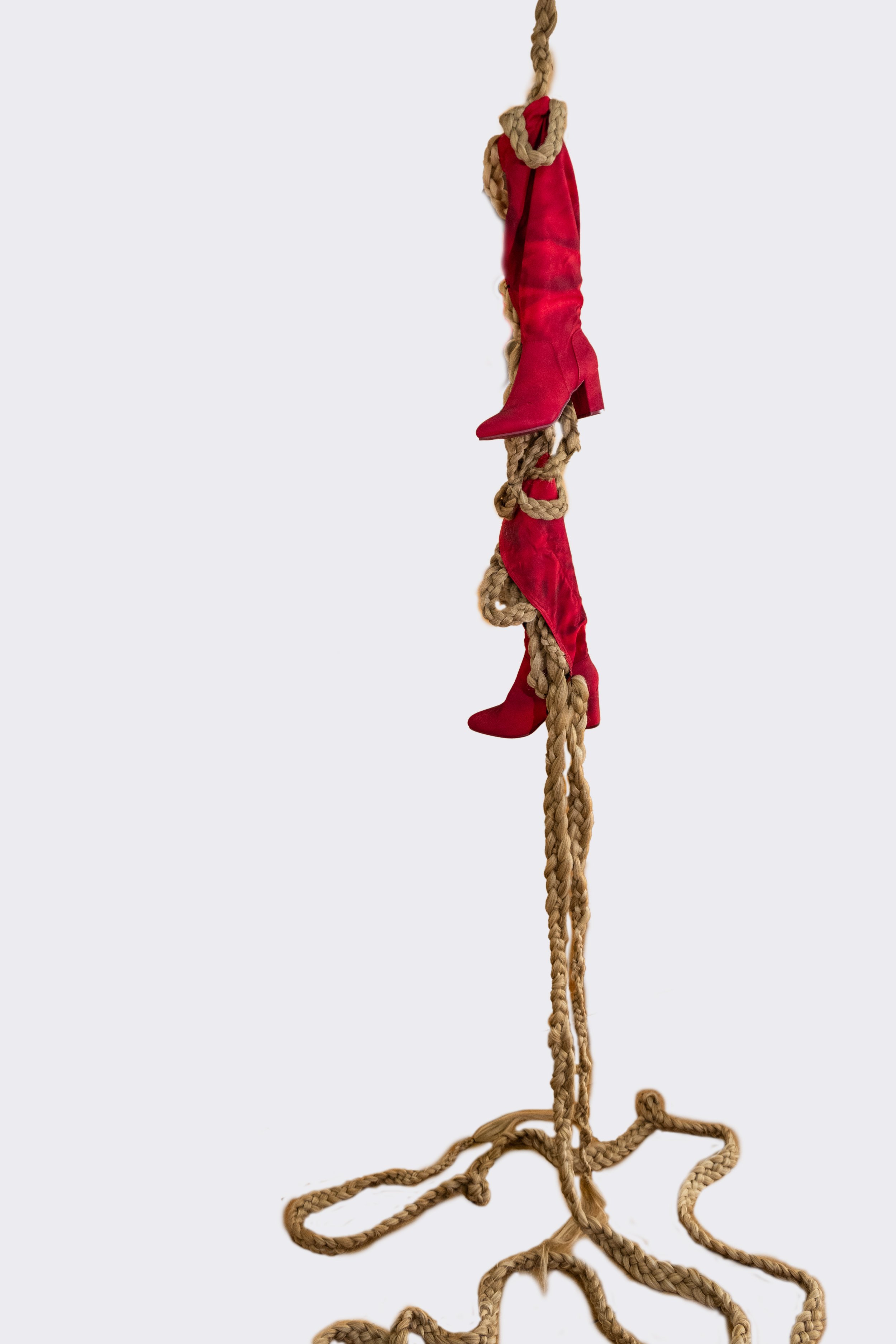 MICKI CHOMICKI
Tuesday - 2024
Synthetic fiber assemblage on red long boots