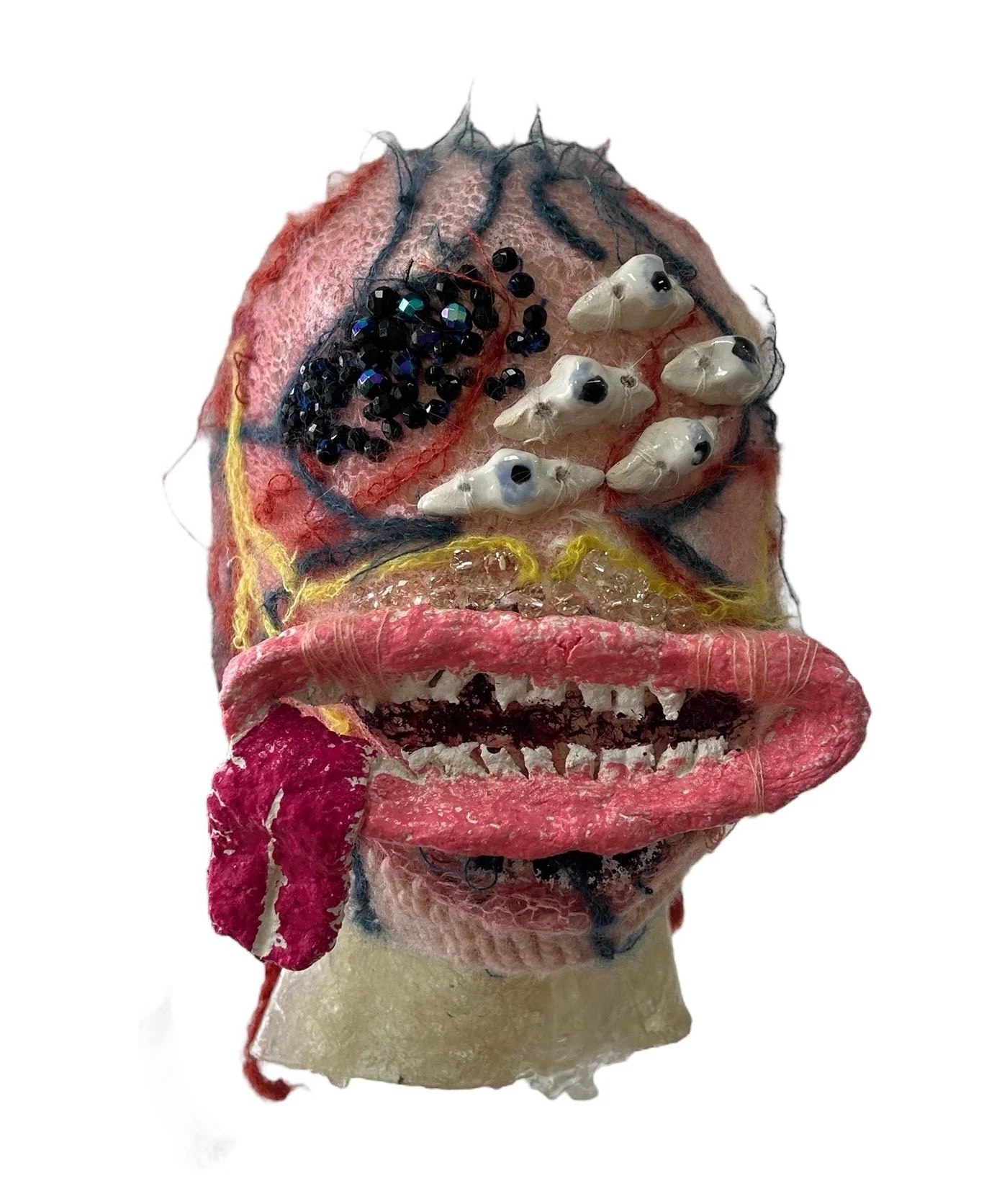  UNTILTED  
 Knitted mask
  27 X 17 X 23 cm 
 Mohair thread, glazed ceramic, varnished
salt dough, Svarowski crystals
 2024