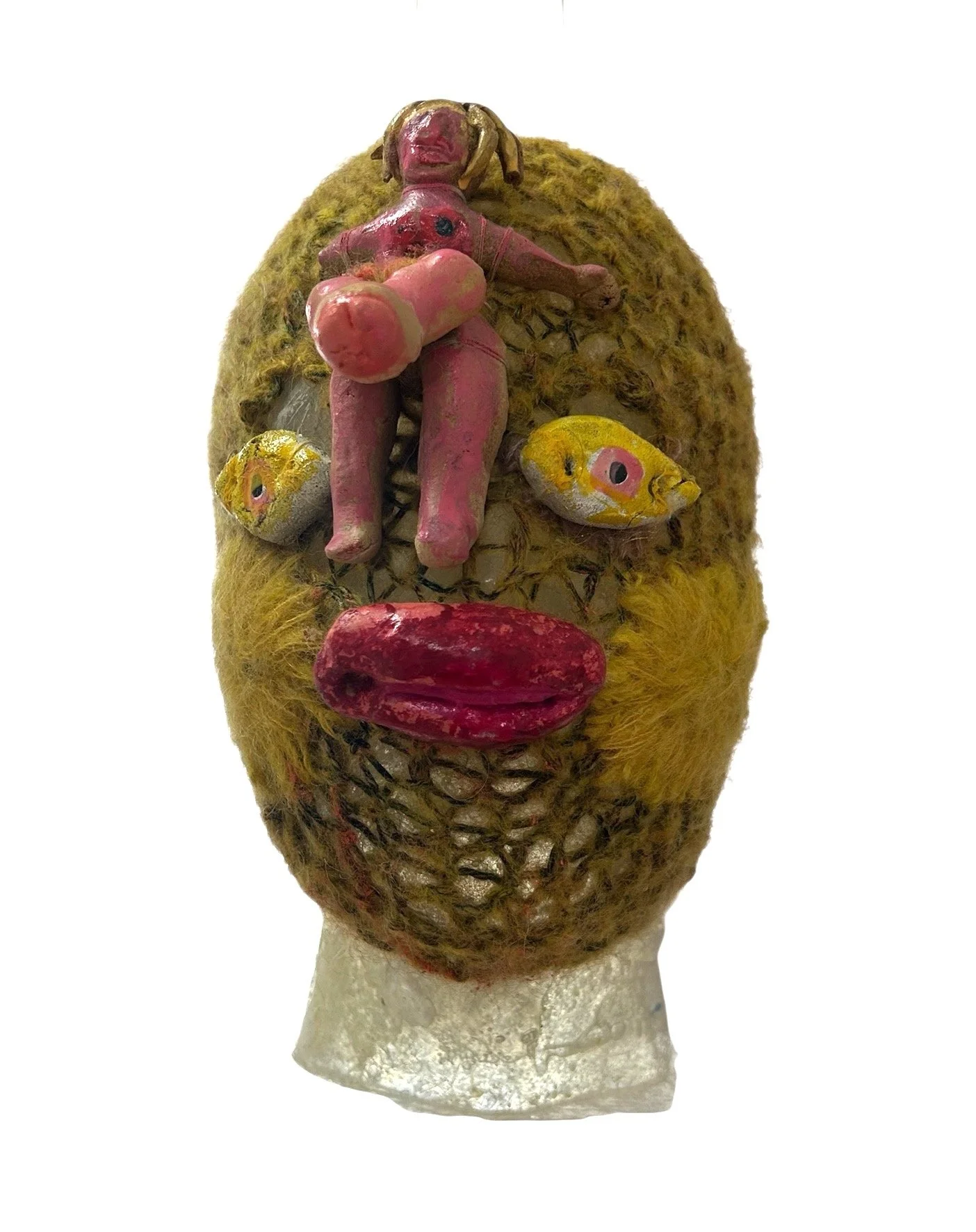  UNTILTED  
 Knitted mask
  27 X 17 X 23 cm 
 Alpaca thread, varnished salt dough,
Svarowski crystals
 2024