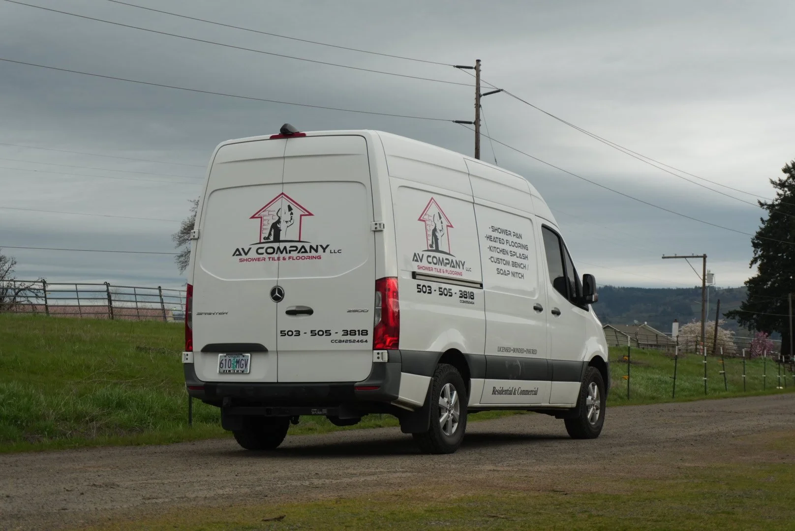 white commercial van with logo stickers for their business. small decals for company logo with custom design in salem oregon independence oregon