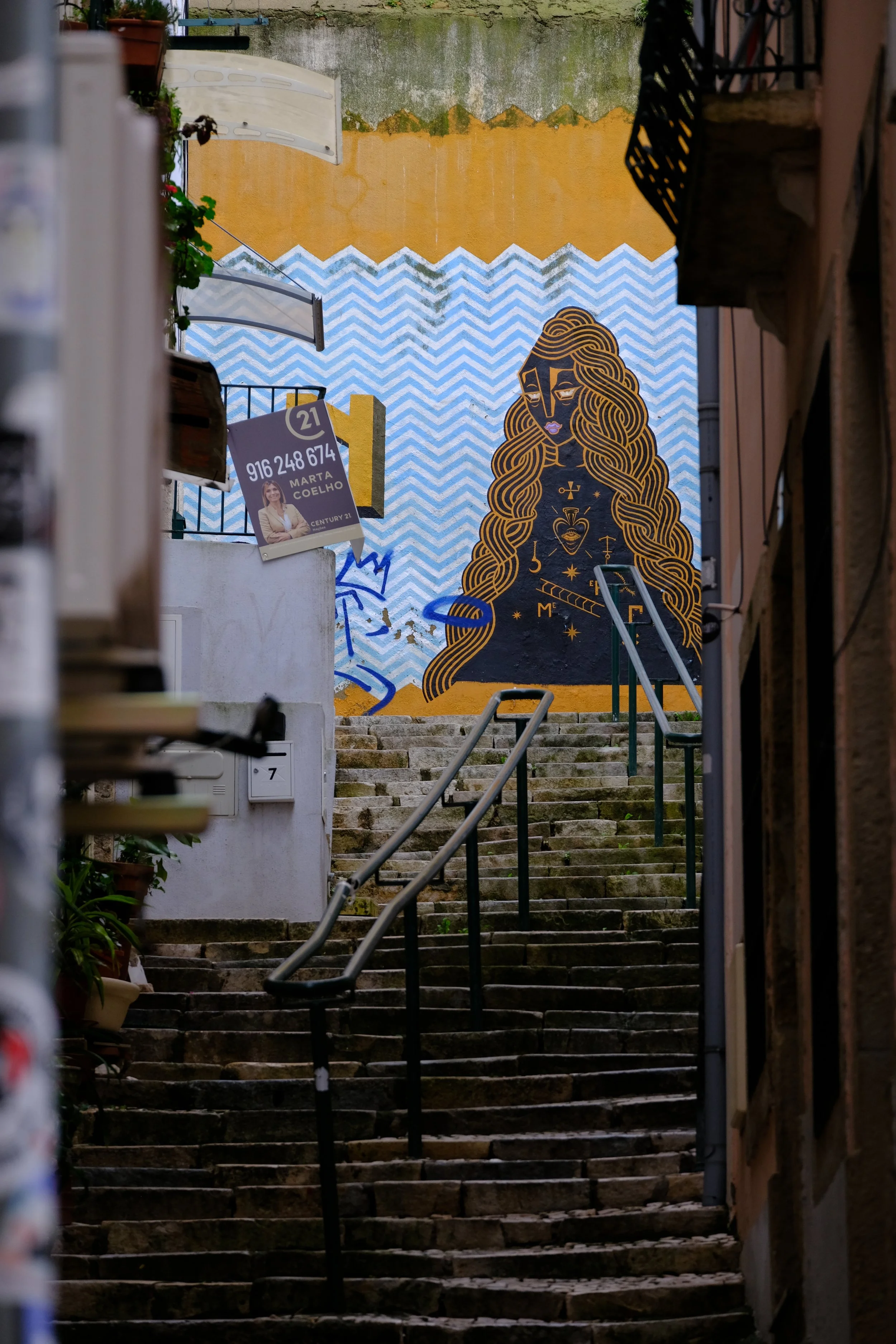 Lisbon alley street art.JPG