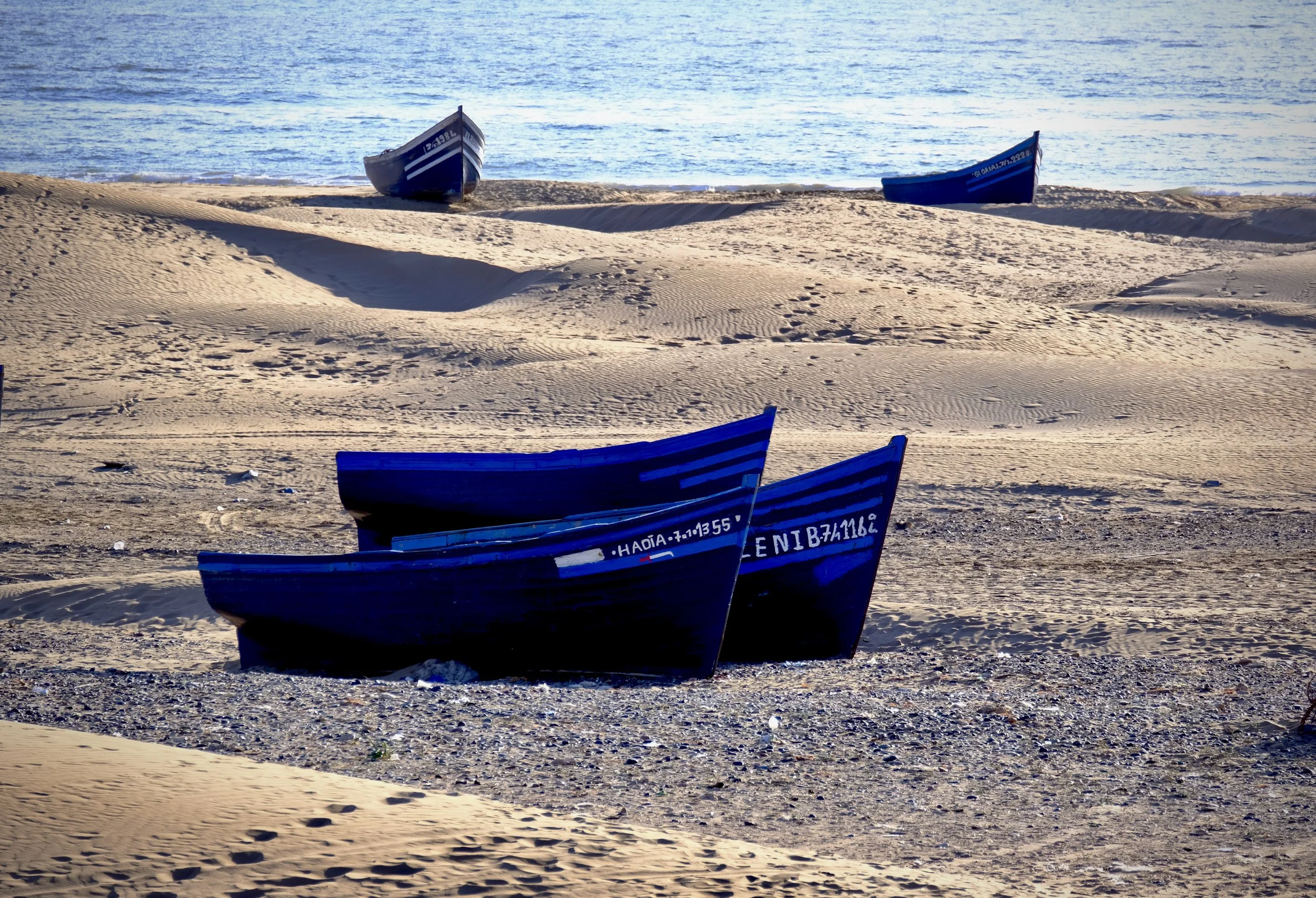 Essouira fishing boats on beach.JPG