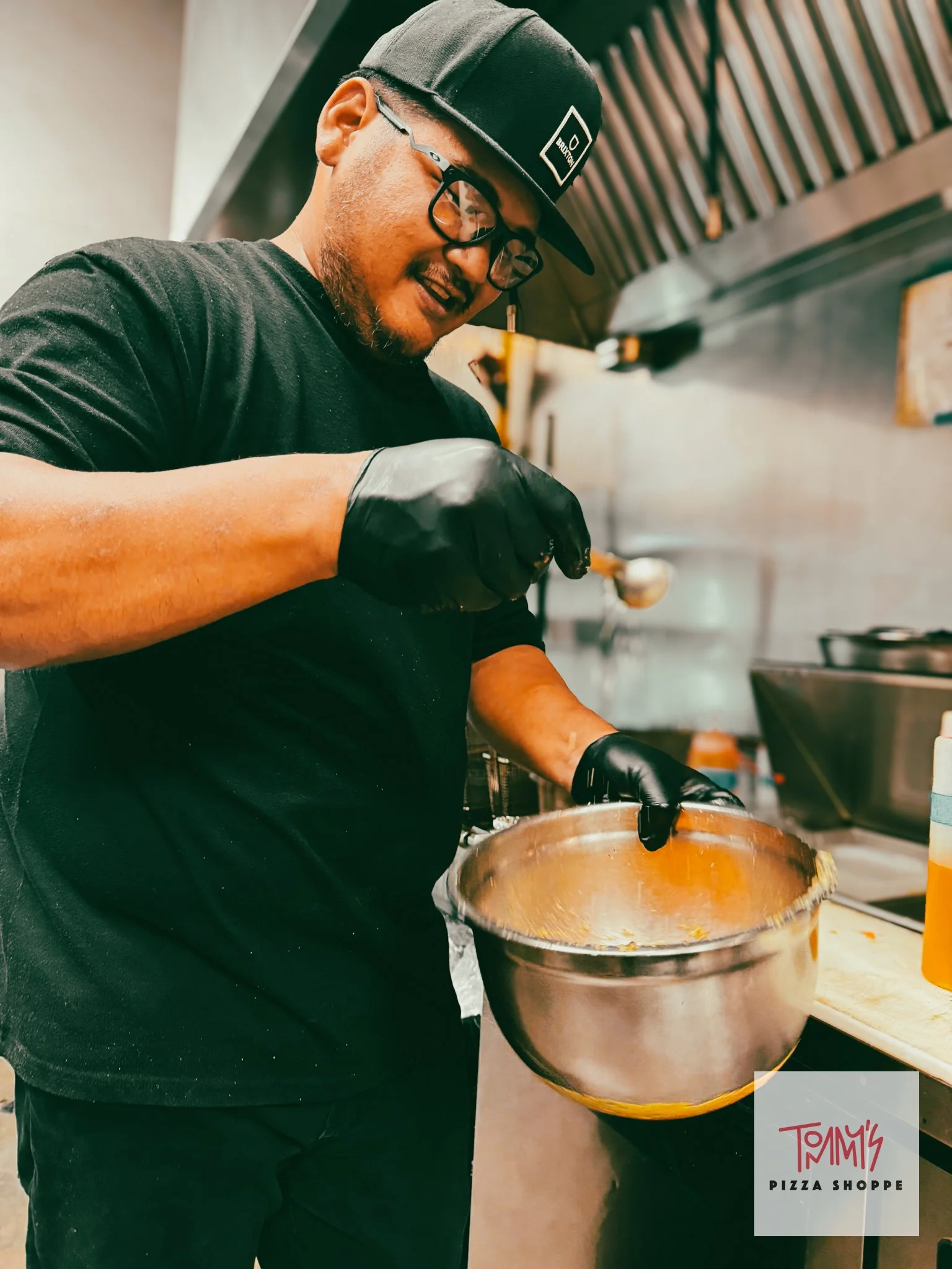 A tommy's team member trained from low experience and moved up to cooking.