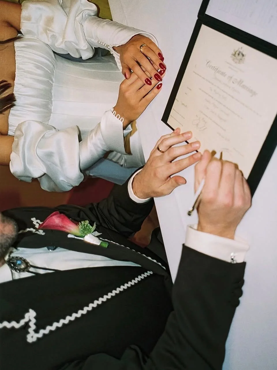 The signing = a brief administrative interlude in an otherwise very romantic day. You, your celebrant and two witnesses put pen to paper, quite literally signing off on the fact that you&rsquo;re now married.

Then the paperwork goes away, and you ge