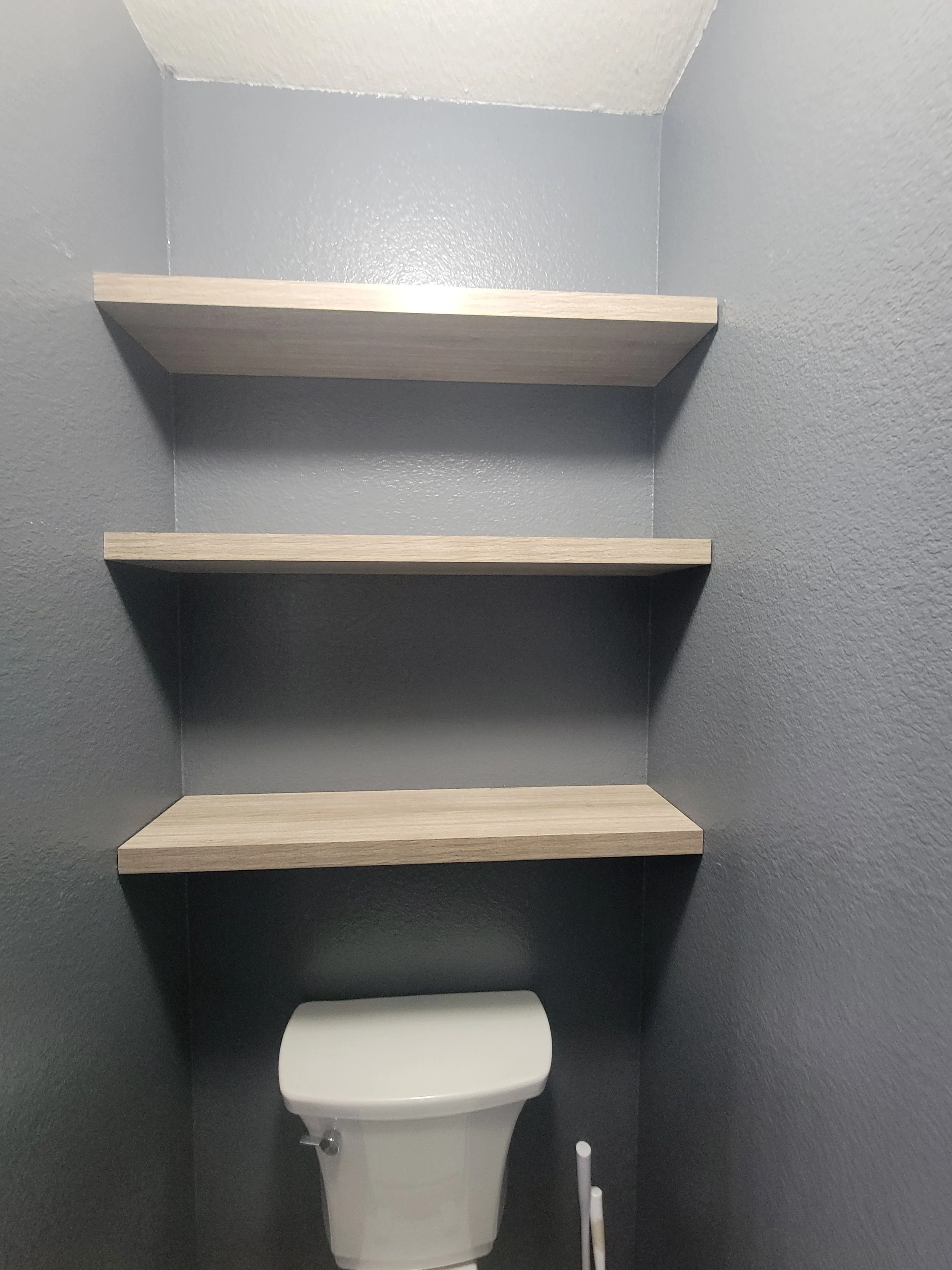 Custom shelving installation by Dragonstone Construction LLC – expert handyman services for home and office organization in Branson, MO.