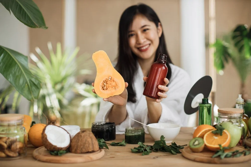 beautiful-healthy-asian-woman-holding-pumpkin-and-2023-11-27-05-14-59-utc.jpg