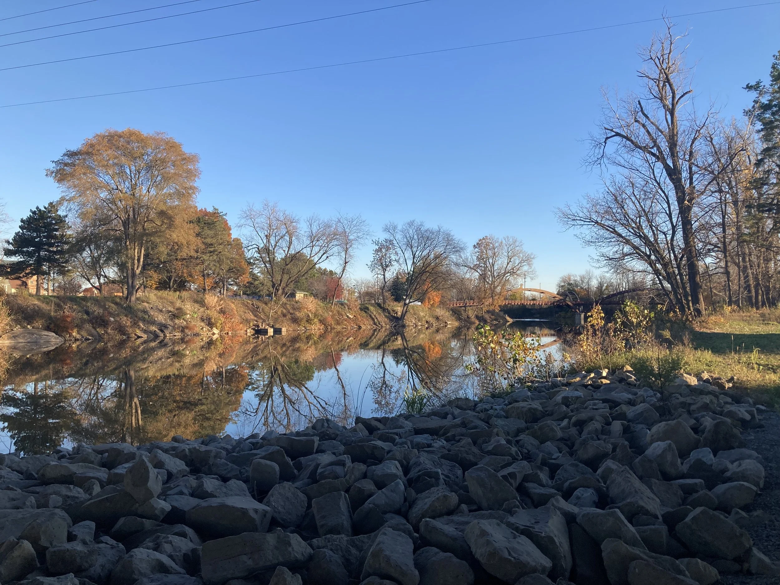 Local bridge, tridge image in the Fall of Midland, Michigan and Tittabawassee River