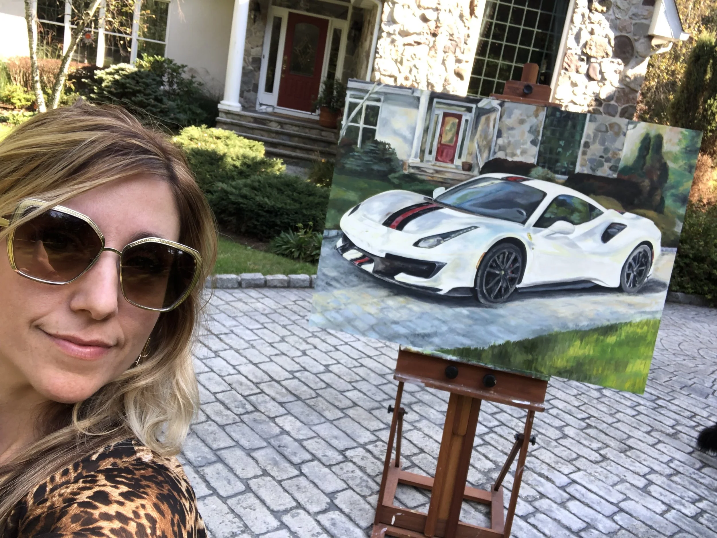 Working live painting the client's home into this piece