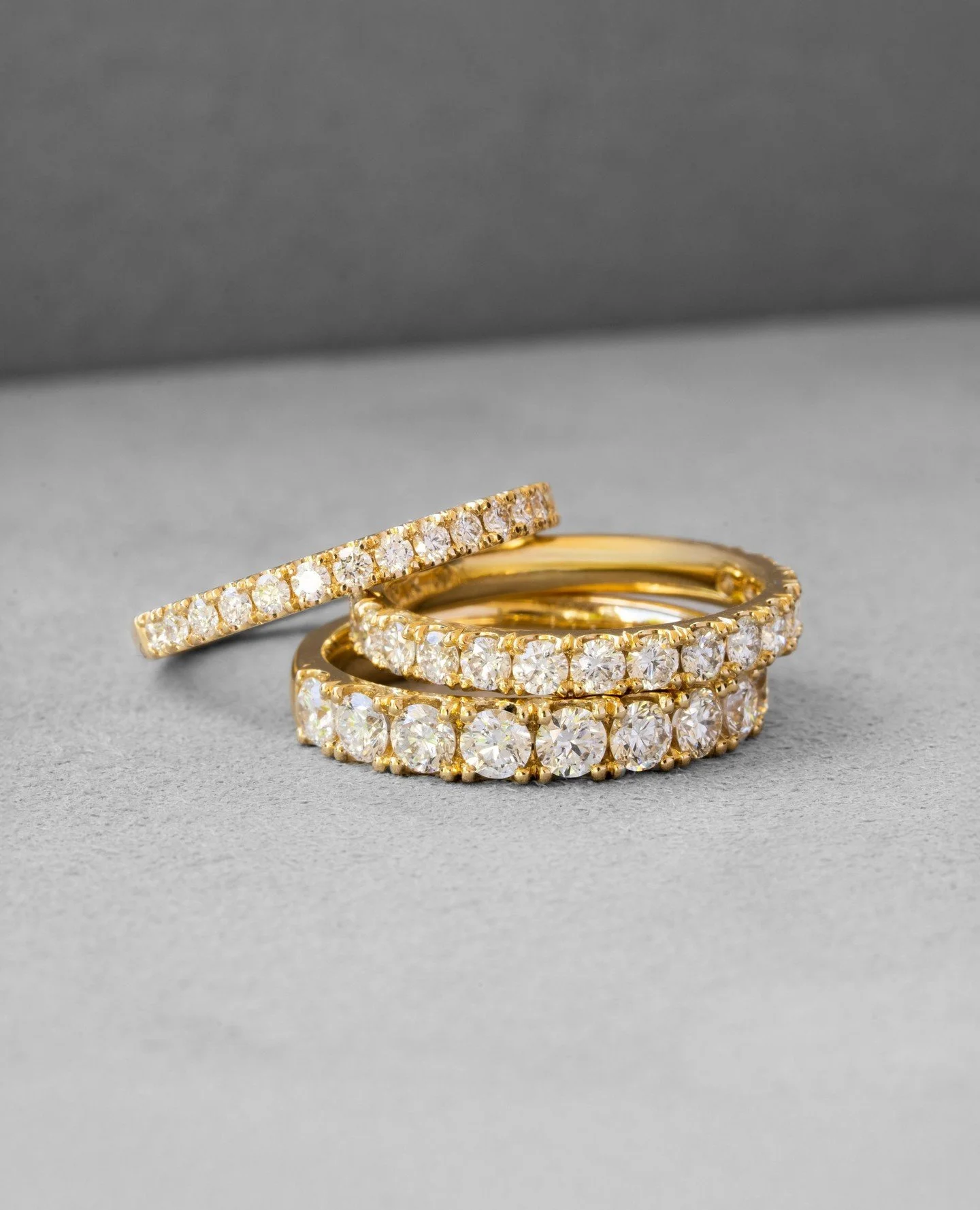 Fine, medium or bold &mdash; nope, not your coffee order. We're talking wedding bands.⁠
⁠
The castle set diamond stack &mdash; timeless, sculptural, sparkly and now available in three widths online.⁠
⁠
Whether you're matching shoulder stones, band th
