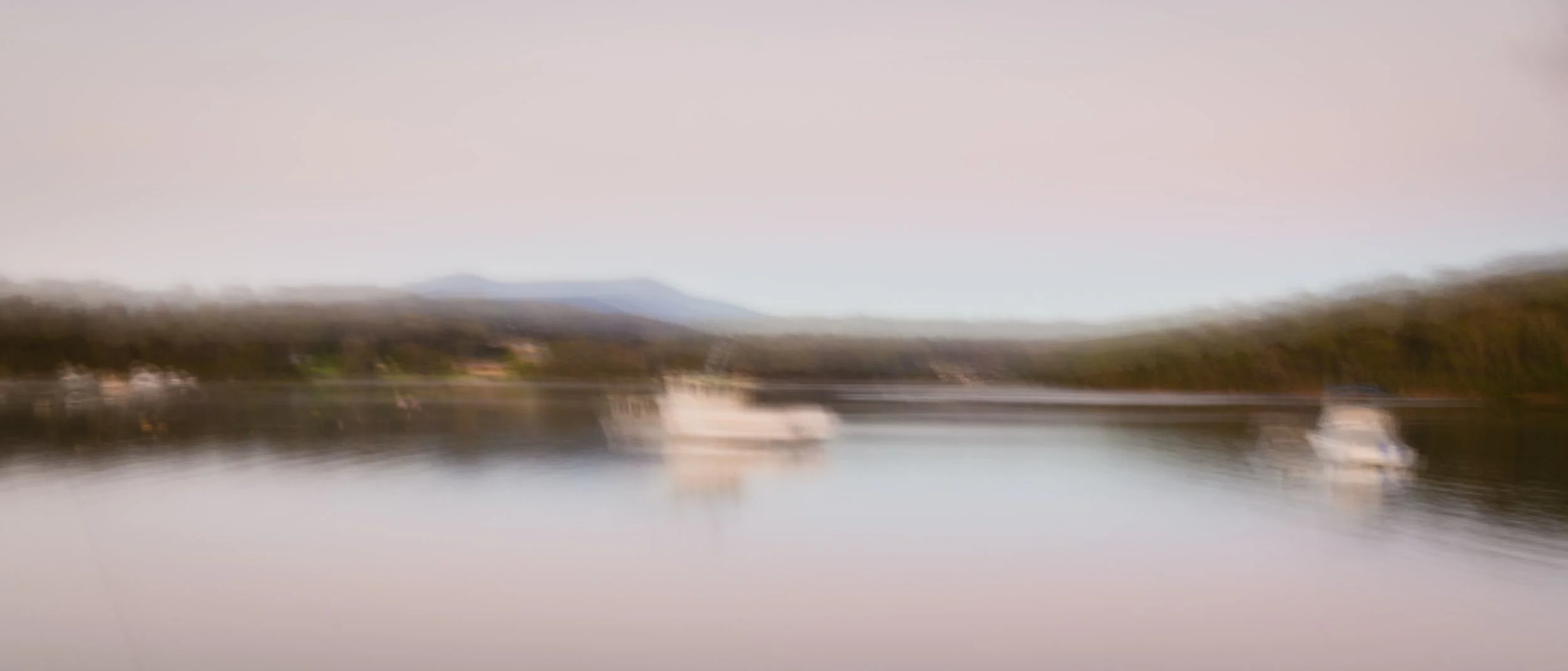 Early morning intentional camera movement image of fishing trawler at anchor, soft light, pastel colours | ICM | Bermagui | Brisbane landscape and travel photographer Ralph McConaghy