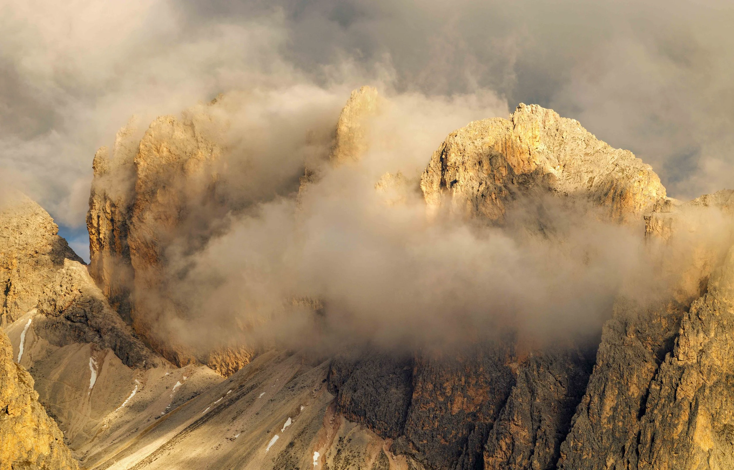 Mountain peaks surrounded by clouds and mist